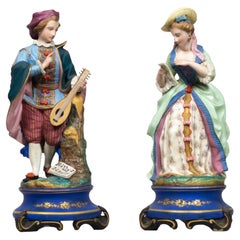 Figuras de porcelana francesa del siglo XIX Guitarrista y cantante