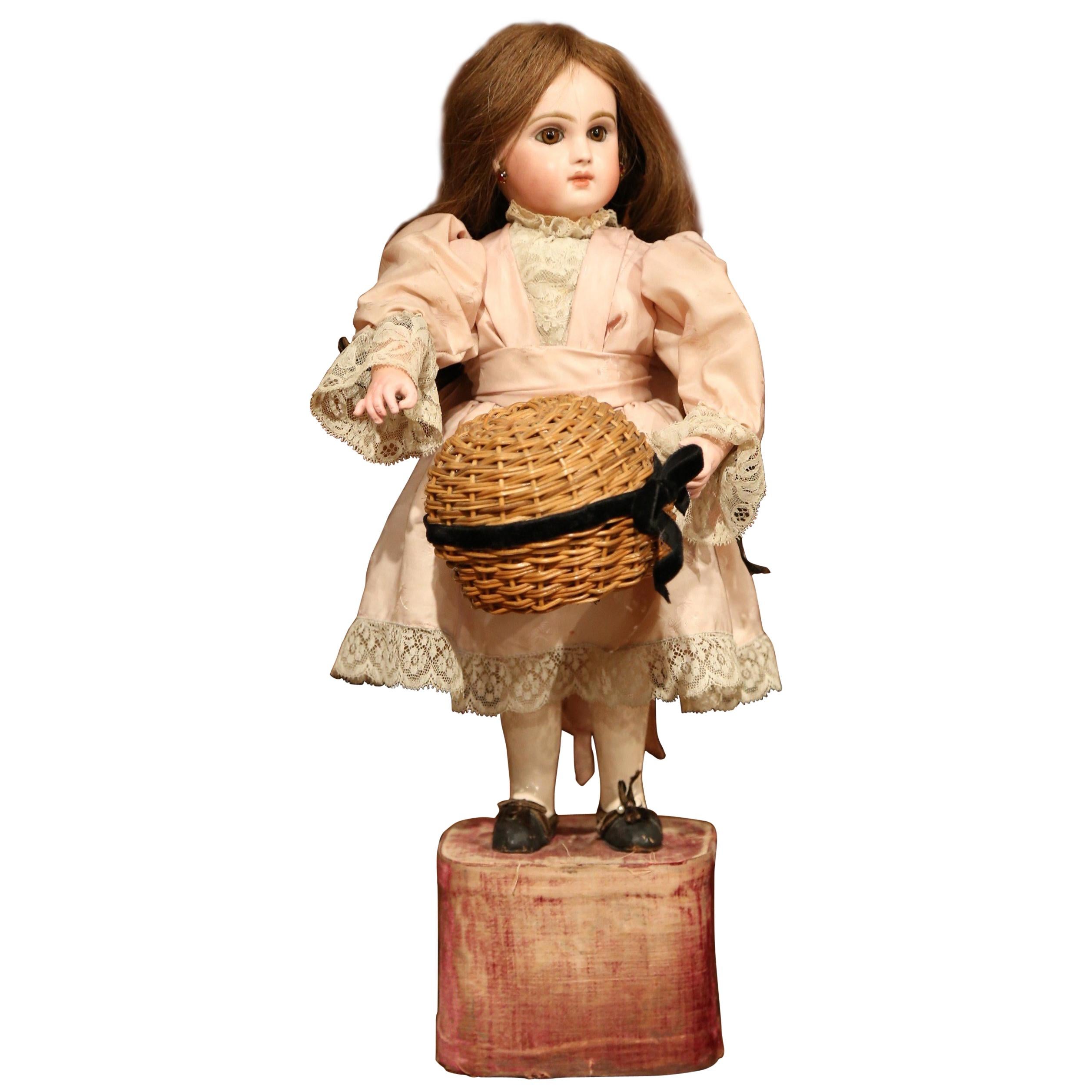 19th Century French Porcelain Musical Automaton Jumeau Doll with Basket