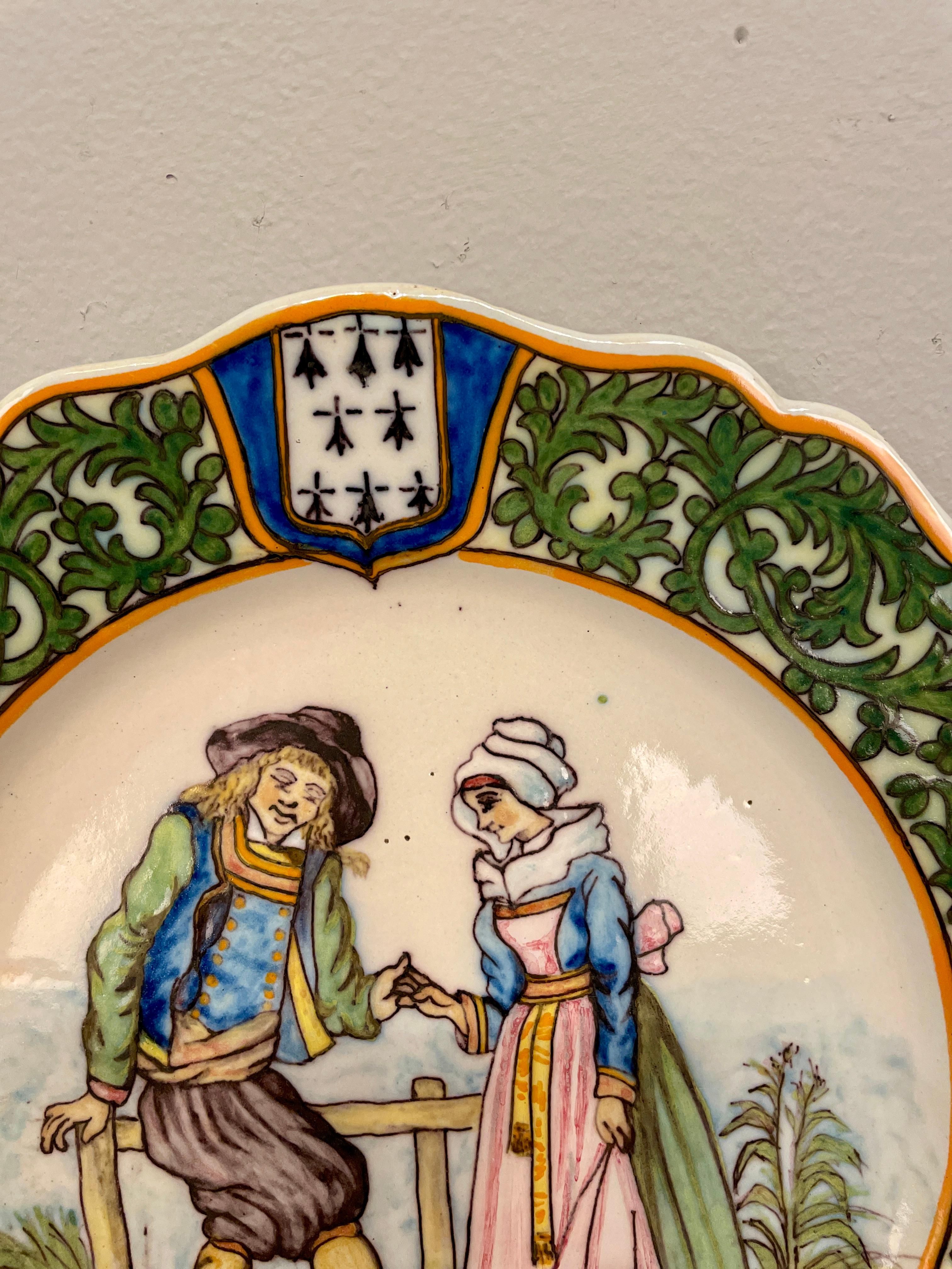 A good 19th century French Porquier Beau Quimper Plate with a  dark green border depicting a courting scene. Good details and in no chips nor hairline.
Signed on the back. Minor wear. Circa 1880-1900
Dimensions are 9.25