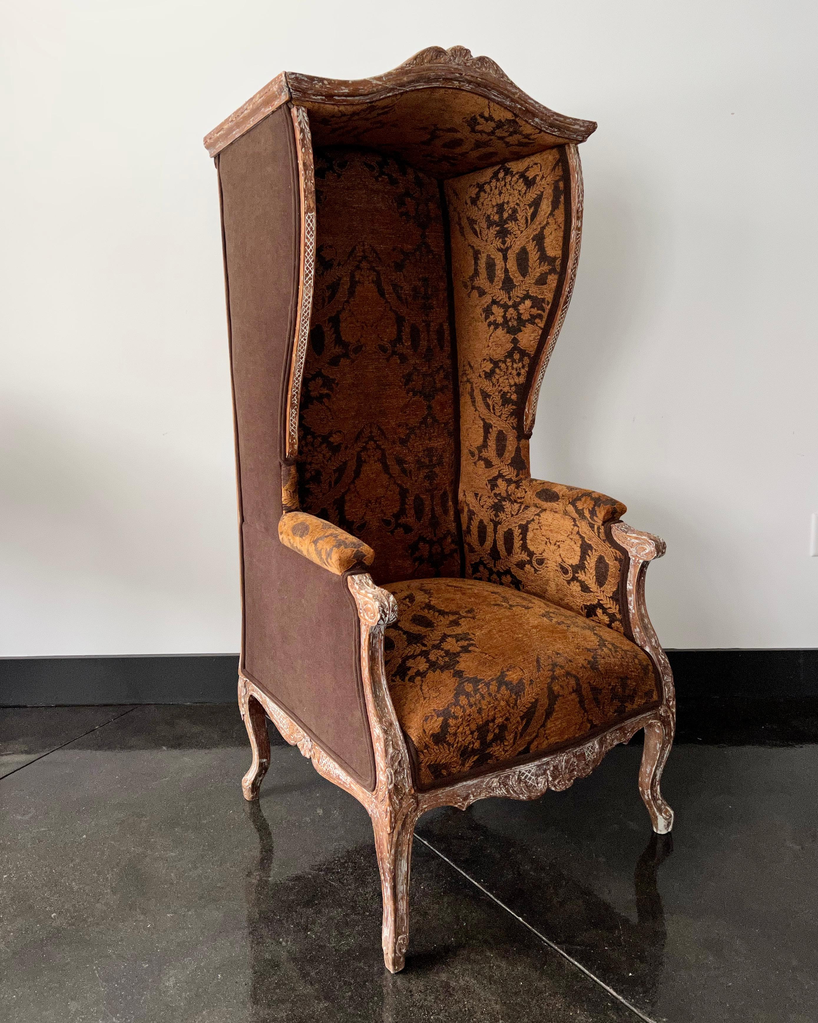 A very unusual model of French antique Portes's chair / Guérite, richly carved oak wood frame and upholstered in velvet with carved cabriole legs.