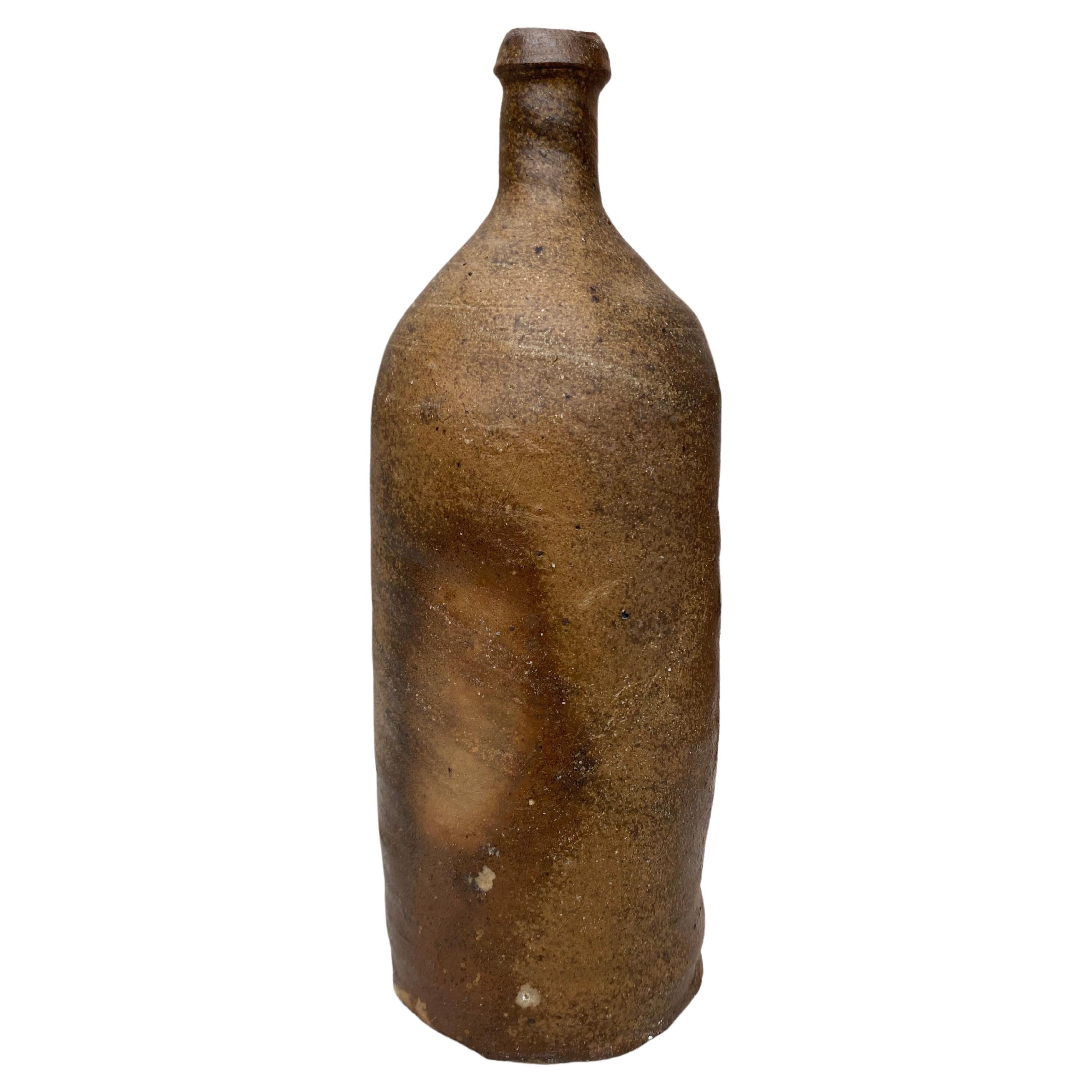 French pottery cider bottle from Normandy, end of 19th century.
13 bottles available, sold separately.
Different sizes.