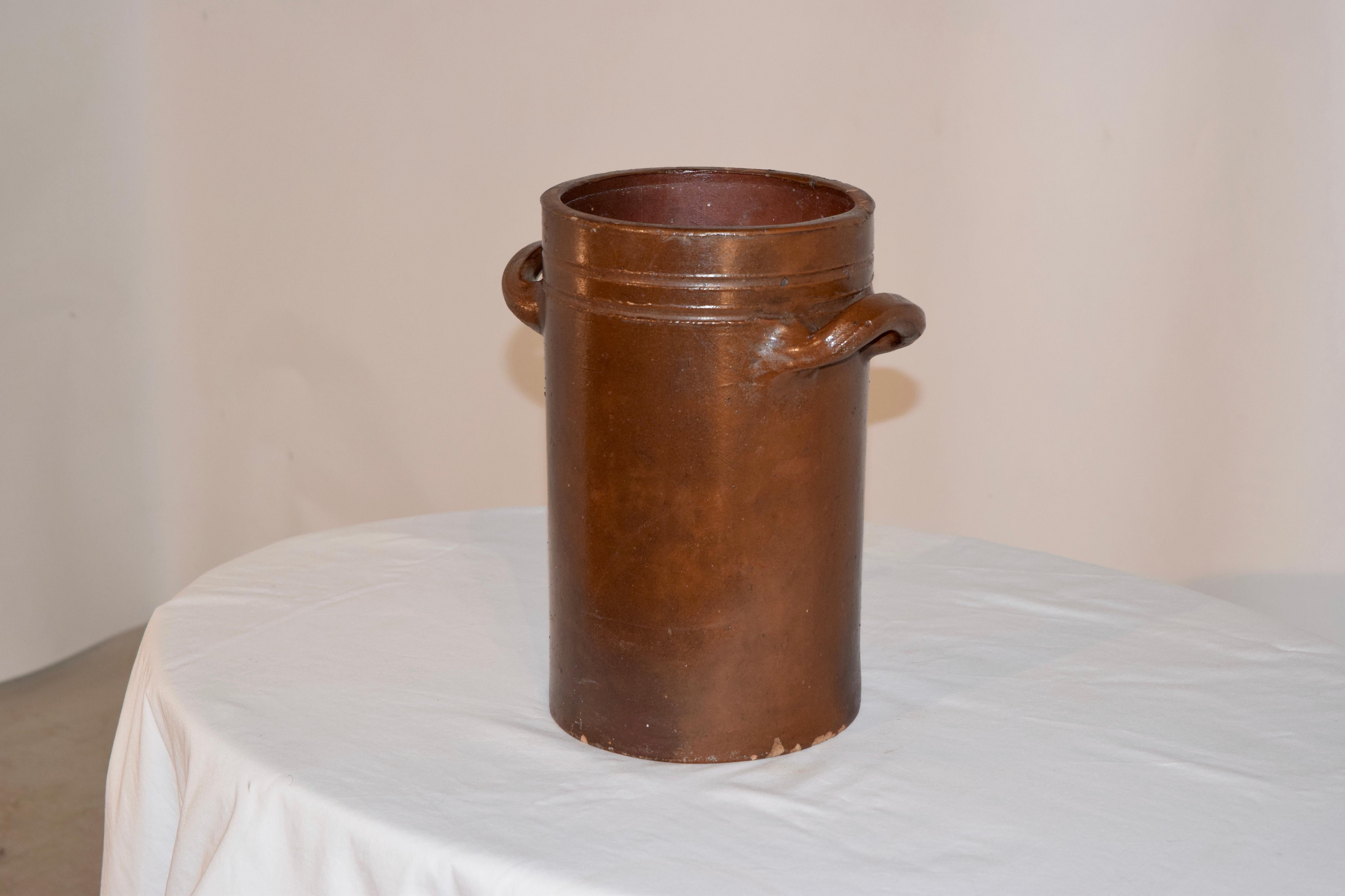 19th century hand thrown pottery vessel from France. Could be used for flowers, or even a wine bottle to keep cool. Nice shape and size.