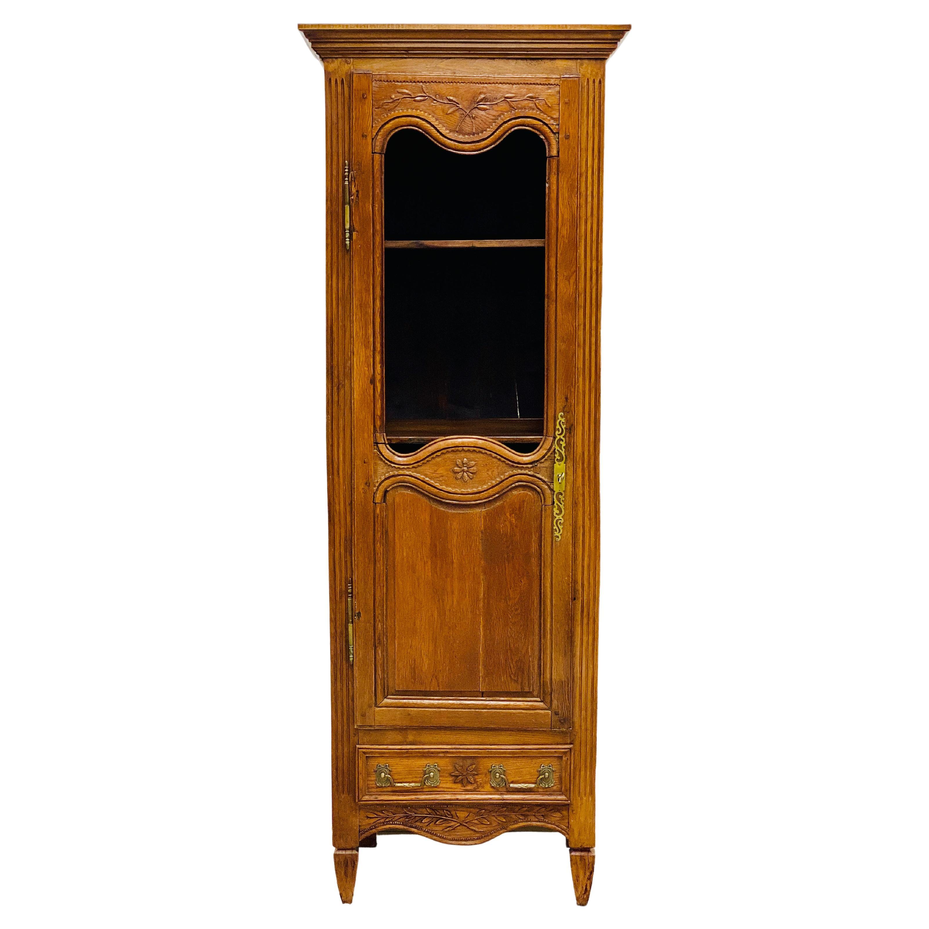 Early 19th Century French Provincial Burled Ash Bookcase with Glass