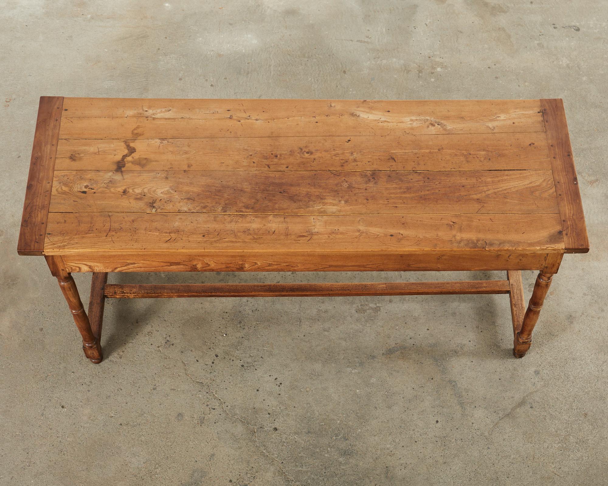 19th Century French Provincial Fruitwood Farmhouse Trestle Dining Table  In Distressed Condition For Sale In Rio Vista, CA