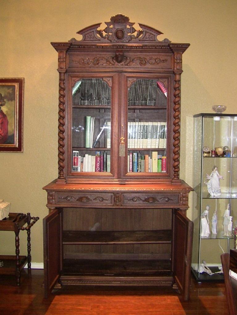 Hand-Carved 19th Century French Provincial Highly Carved Oak Hunt Bookcase For Sale