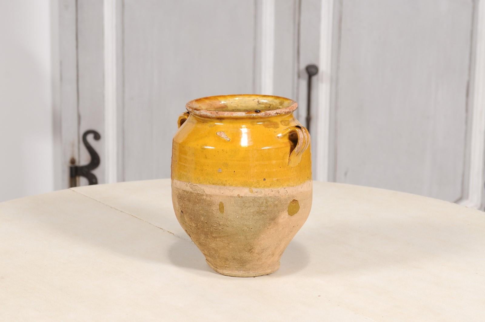 Pottery 19th Century French Provincial Rustic Pot à Confit with Yellow Glaze and Handles For Sale