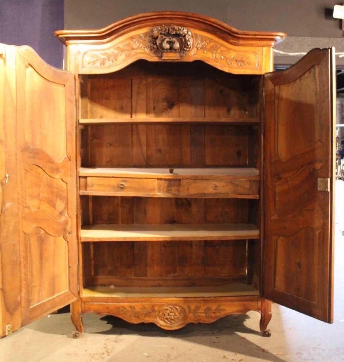 19th Century French Provincial Walnut and Cherryood Armoire with Carved Doves 5