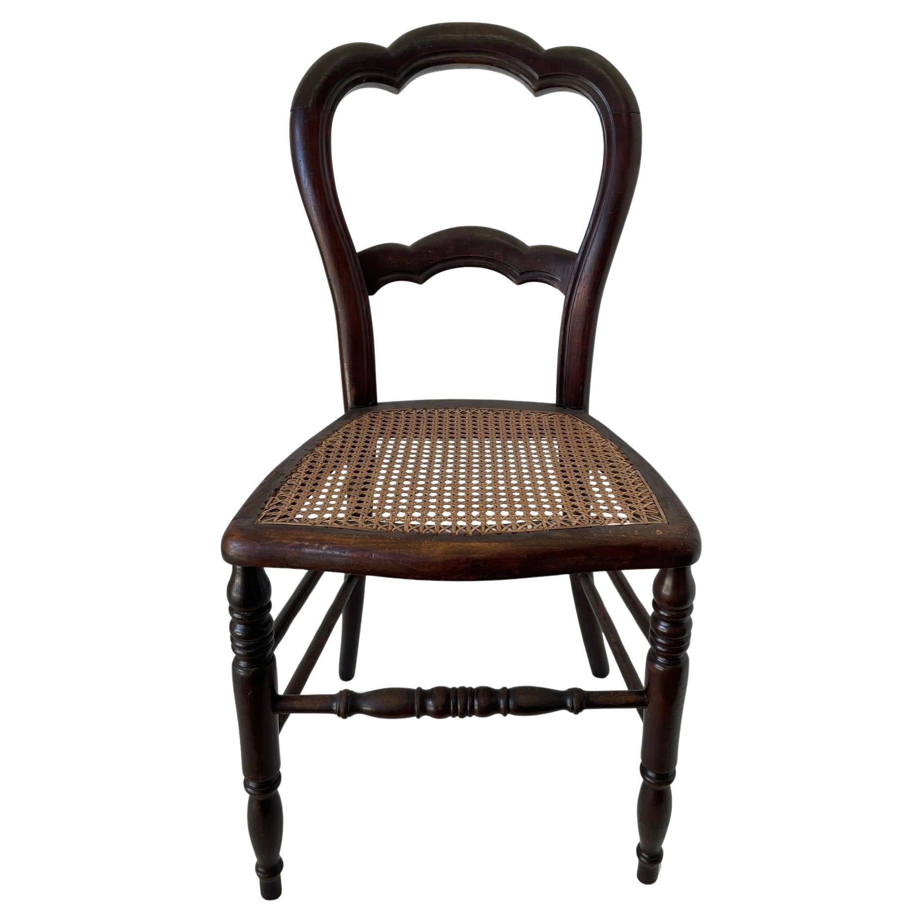 19th Century French Provincial Walnut Caned Chair For Sale