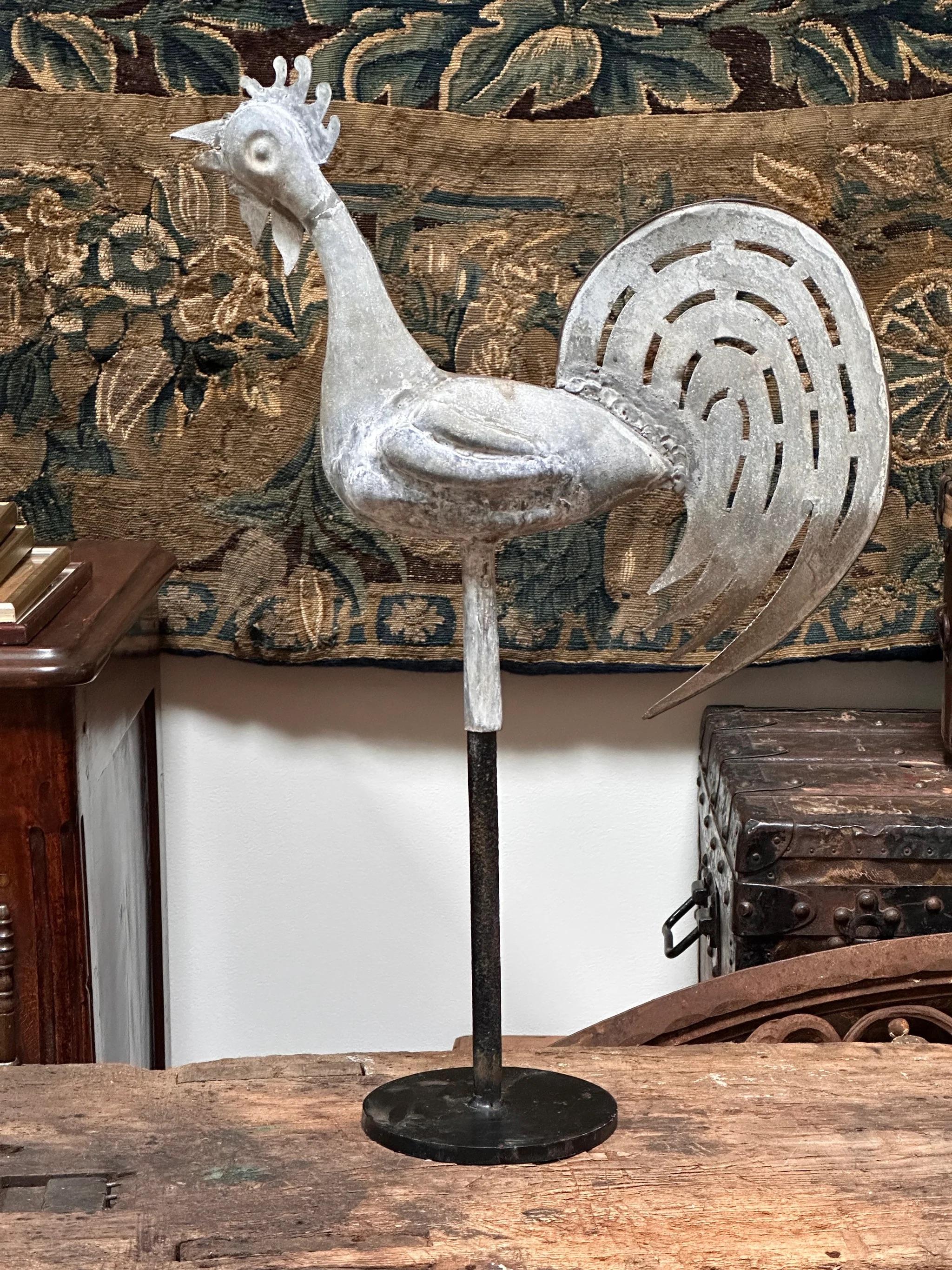 19th Century French provincial zinc rooster mounted on stand.  Height on stand 24.5” 18” w. x 4” . 

