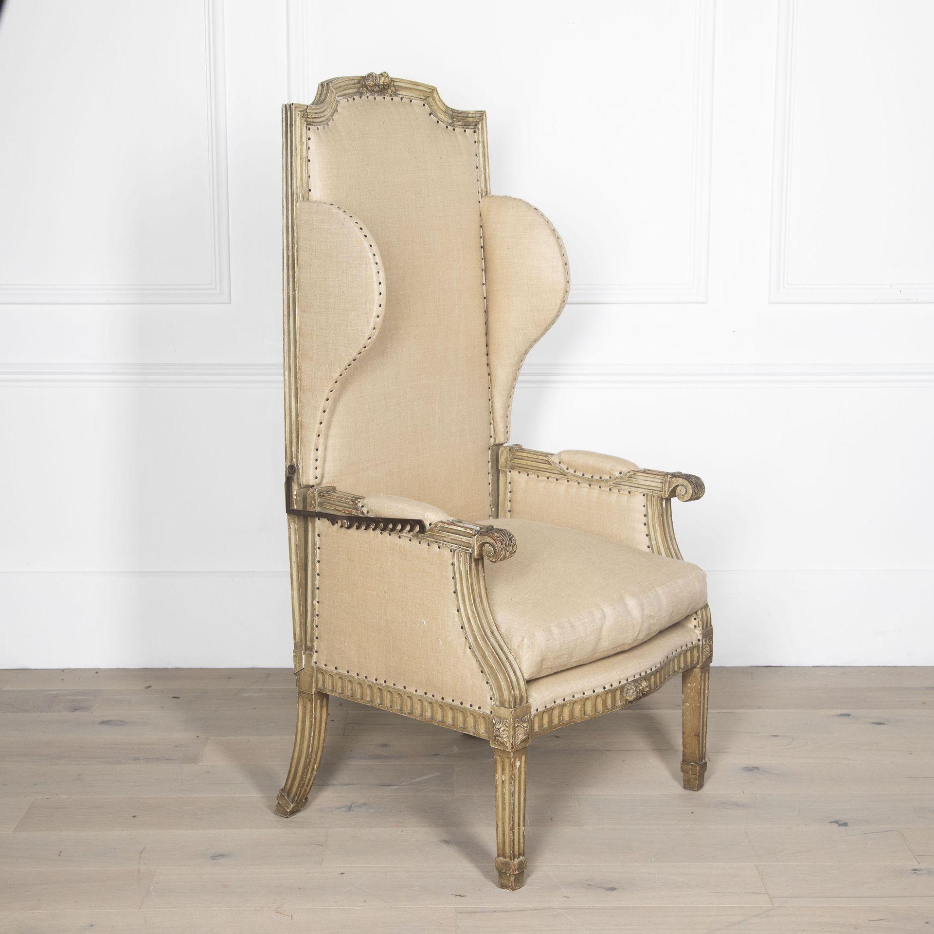 19th century highly unusual French Louis XVI painted reclining wing chair. The very high back with a carved and shaped top. The shallow wings on a channelled frame, the whole back reclining on steel ratchets.The arms carved with acanthus leaves and