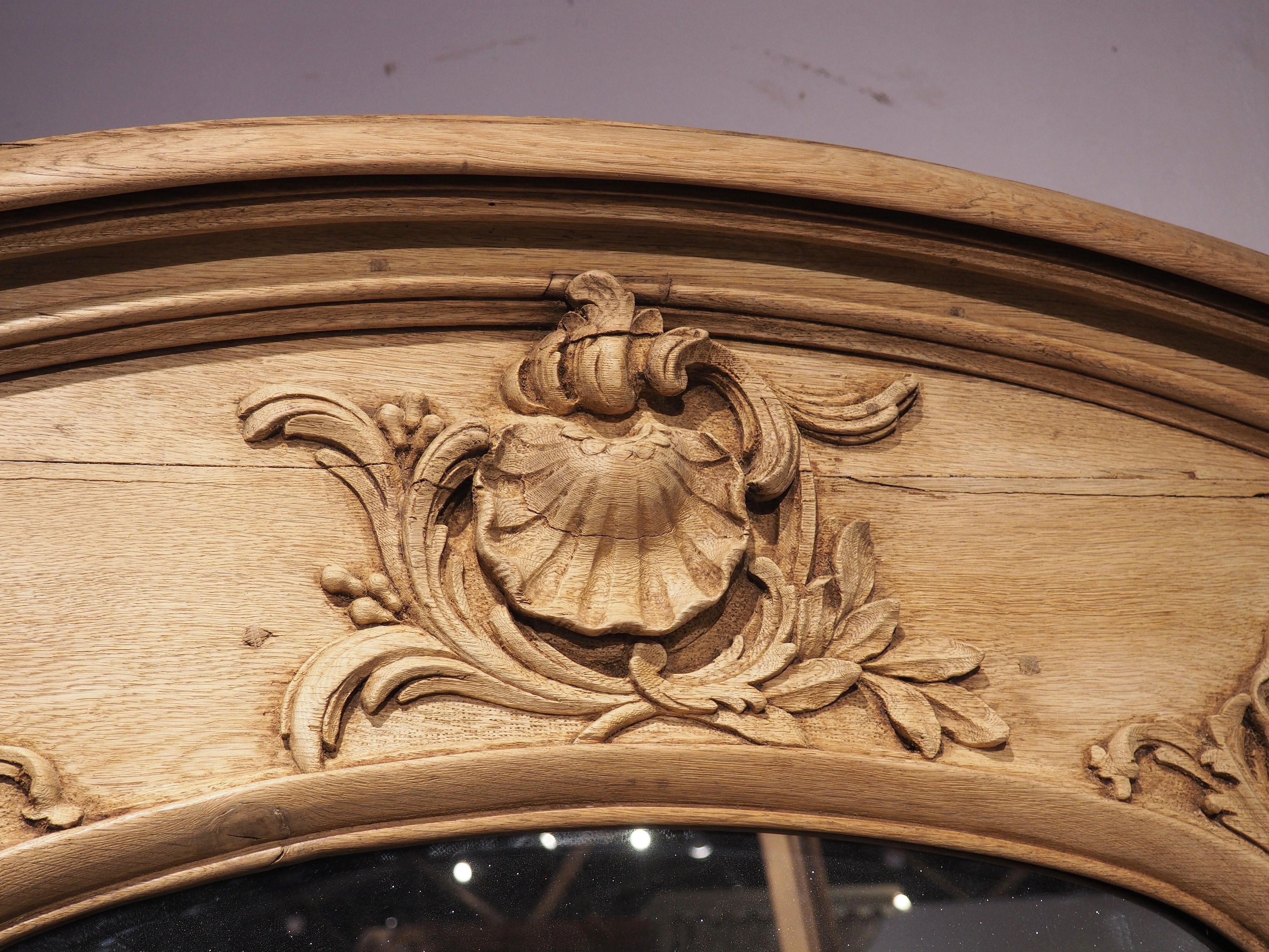 Hand-Carved 19th Century French Regence Style Bleached Oak Trumeau Mirror For Sale