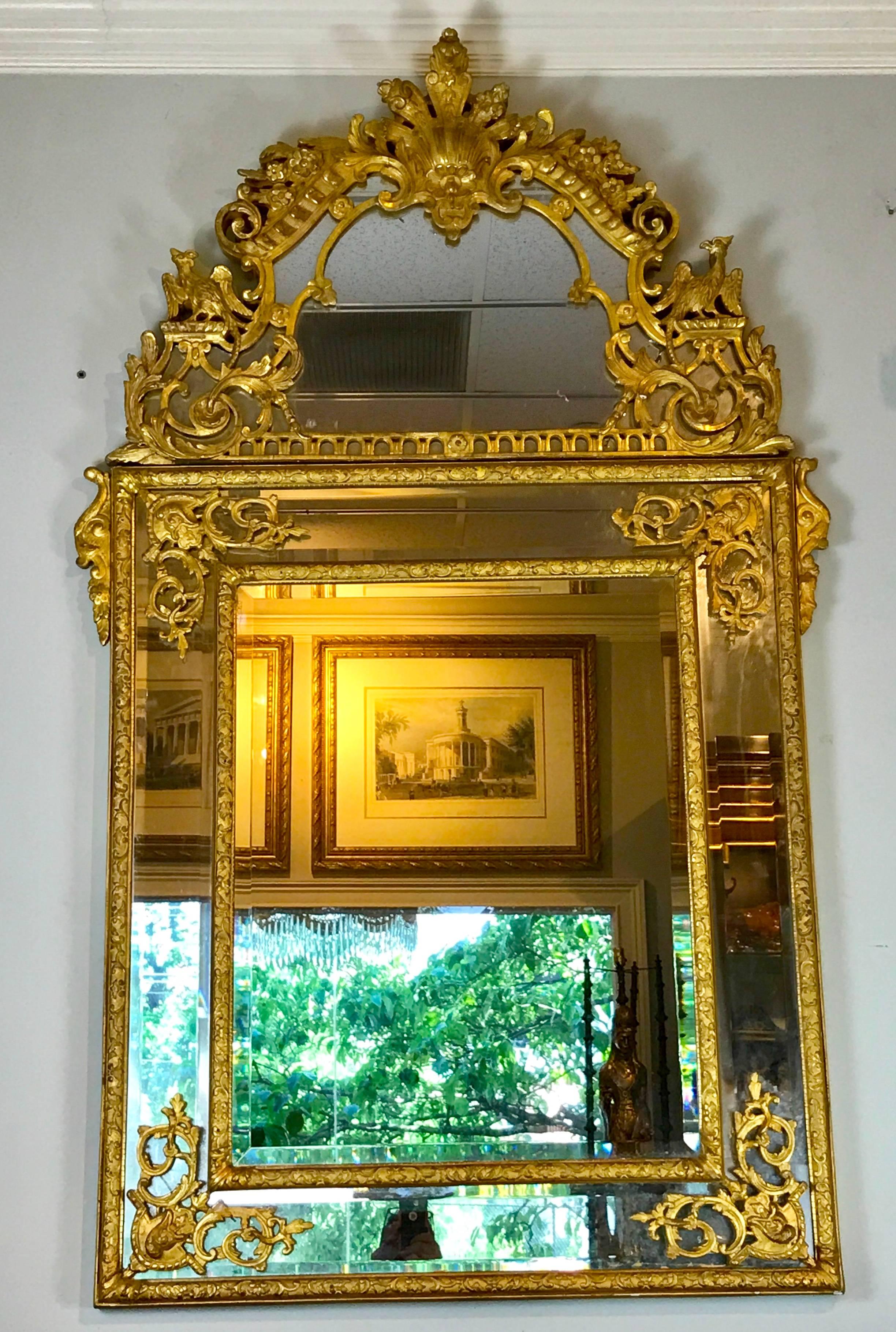 19th century French Regence style giltwood mirror, a substantial finely carved, gesso and water gilt mirror with original or antique mirror. 42