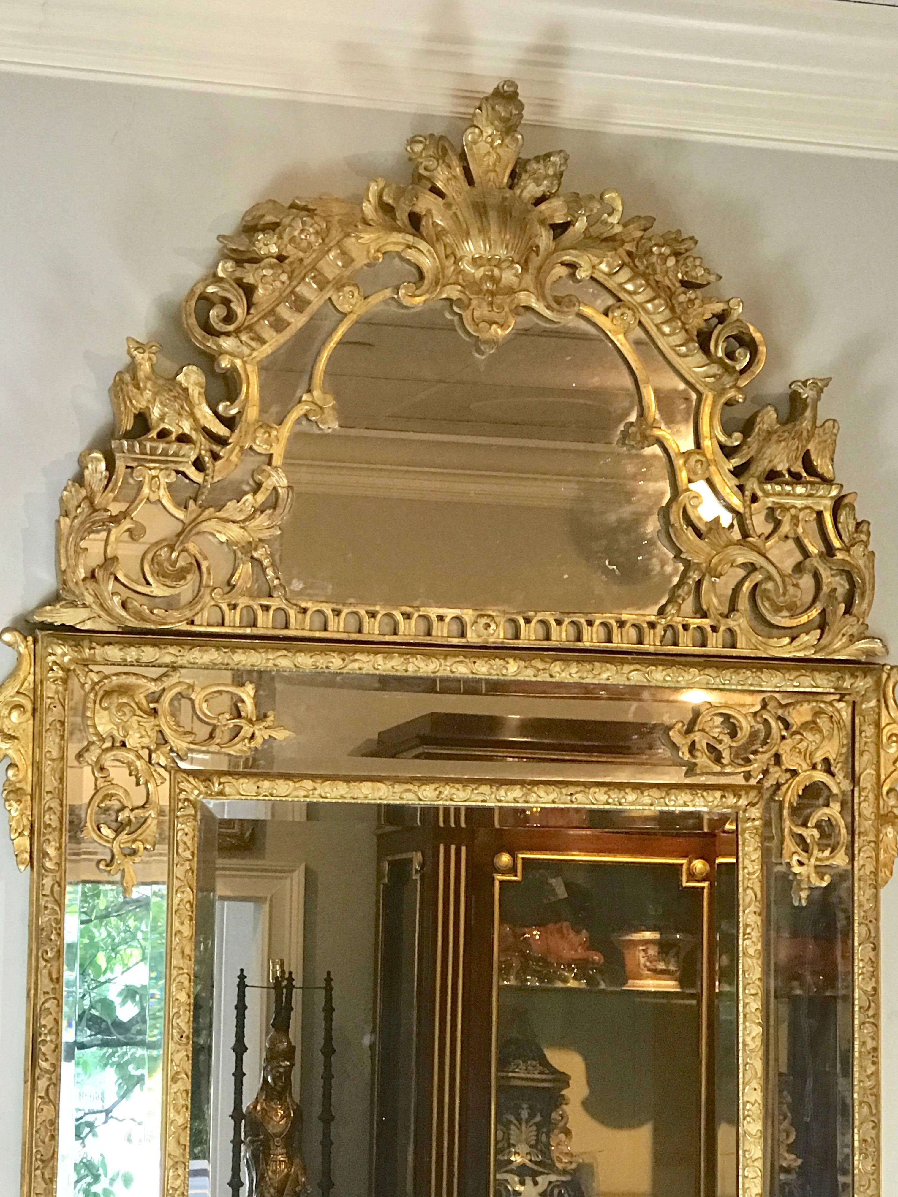 Carved 19th Century French Regence Style Giltwood Mirror For Sale