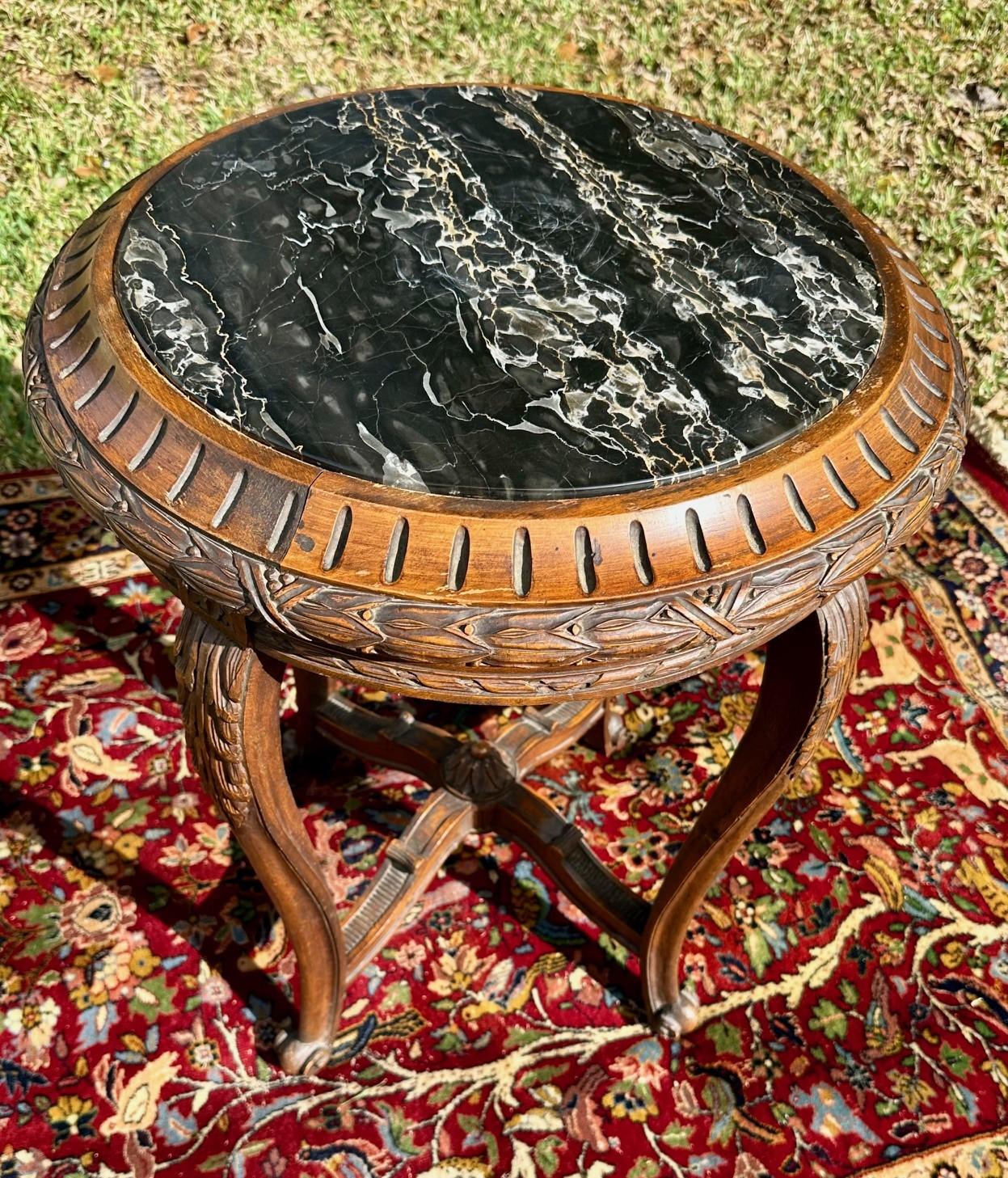 Belgian Black Marble 19th Century French Regence Style Round Marble Top Side Table. For Sale