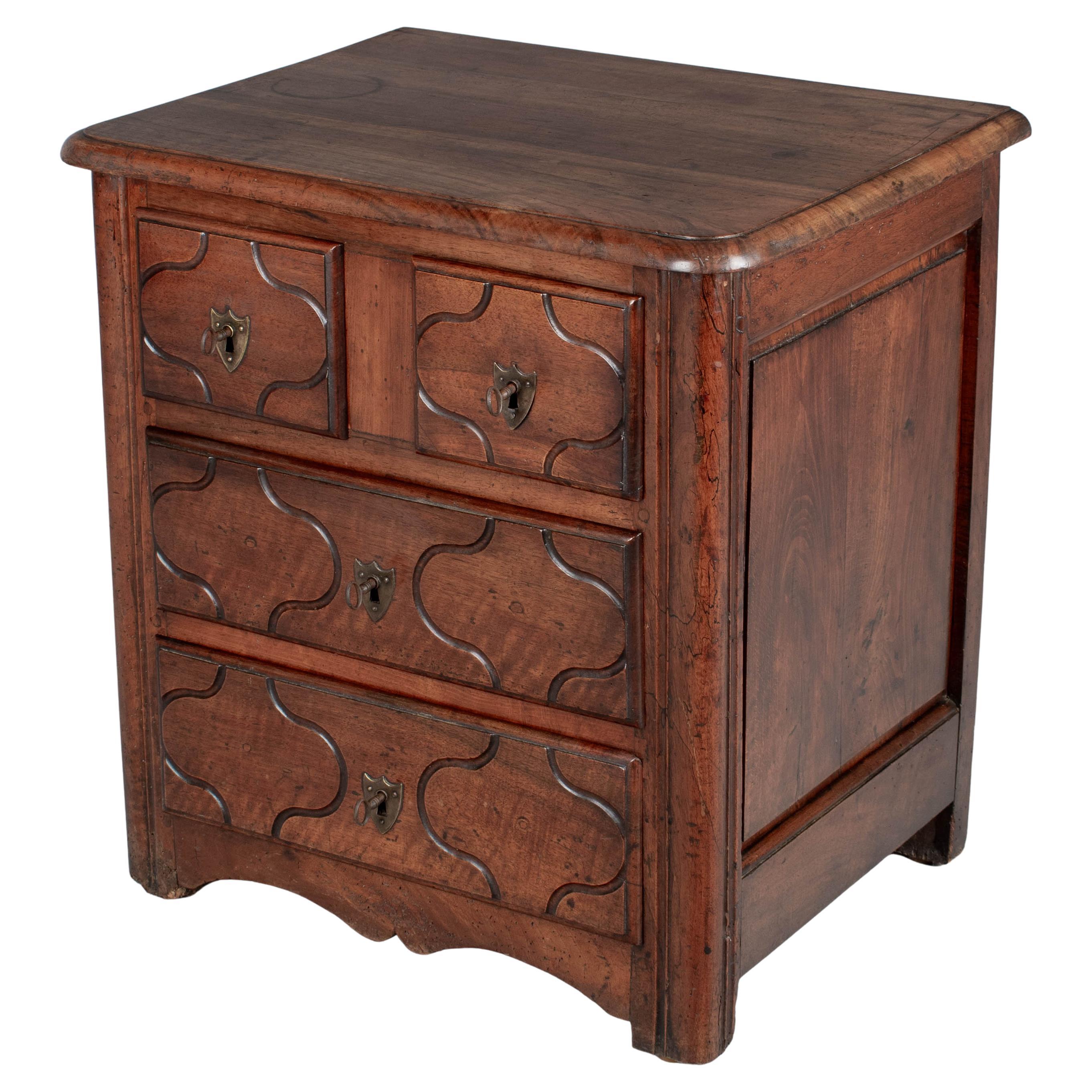 Carved Commodes and Chests of Drawers