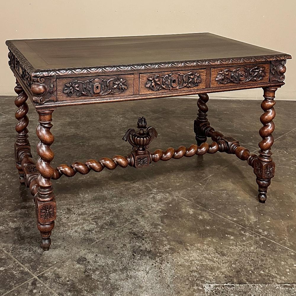 19th Century French Renaissance Barley Twist Desk ~ Bureau Plat is a splendid example of the period, and unusual for having three drawers.  Hand-crafted and sculpted from old-growth oak, it features a fully gadrooned top edge overlooking the
