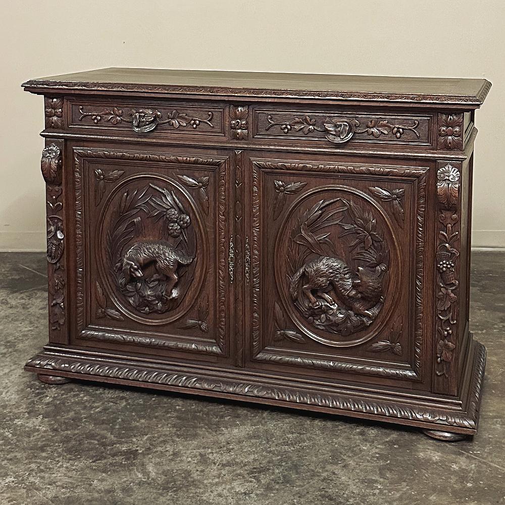 19th Century French Renaissance Buffet with Fox & Hound combines expert hand-craftsmanship with artistic sculpture to create a master work that all will admire!  The timeless casework includes boldly carved molding from the top edge to the prominent