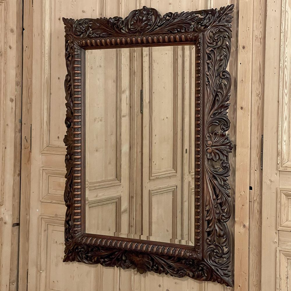 Beveled 19th Century French Renaissance Carved Walnut Wall Mirror For Sale