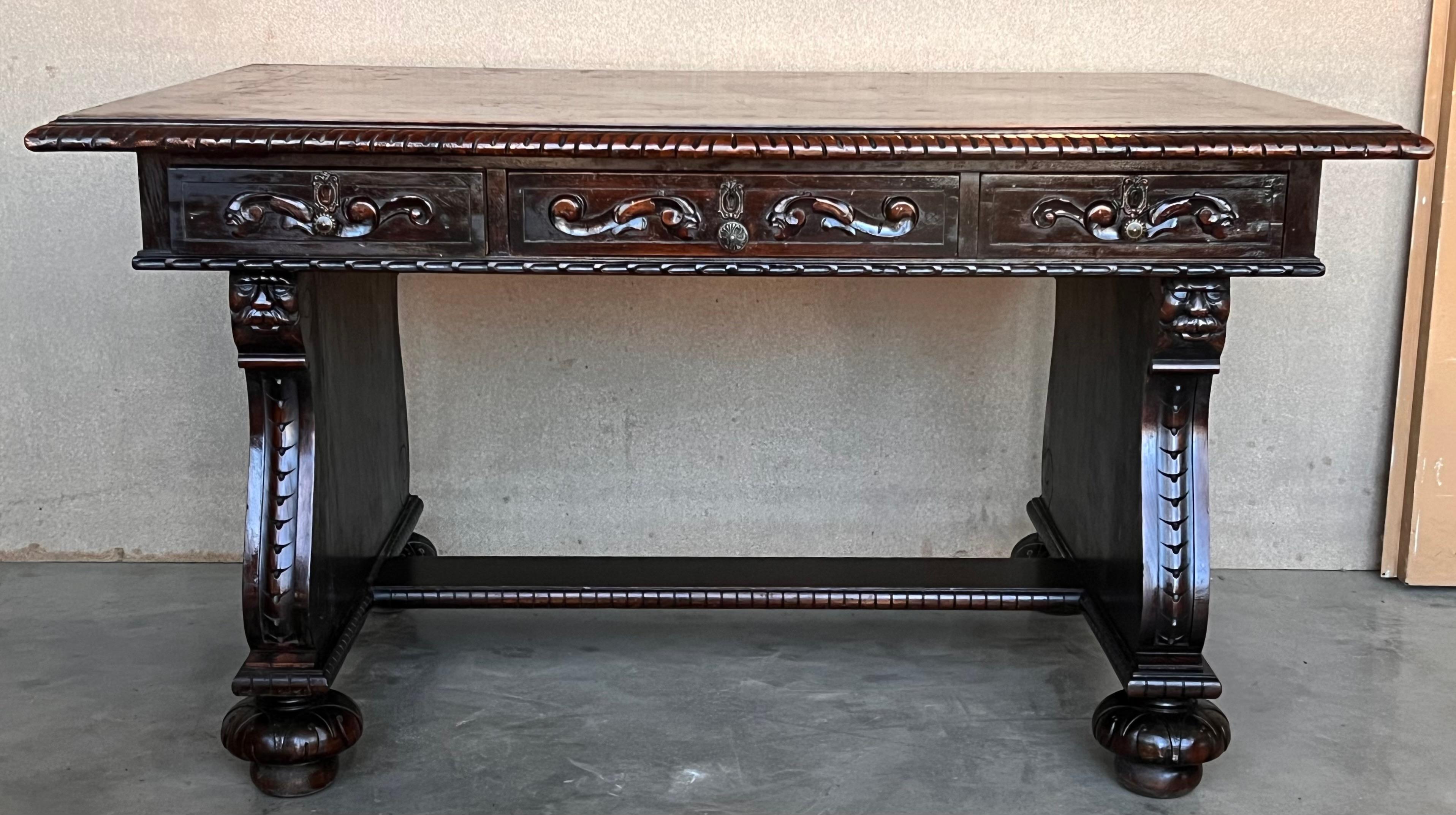 19th Century French Renaissance desk with dolphins is a remarkably sculpted work with fully carved apron all around, making it a great choice for placement in the center of the room if so desired. Hand-crafted from old-growth oak, it features a trio