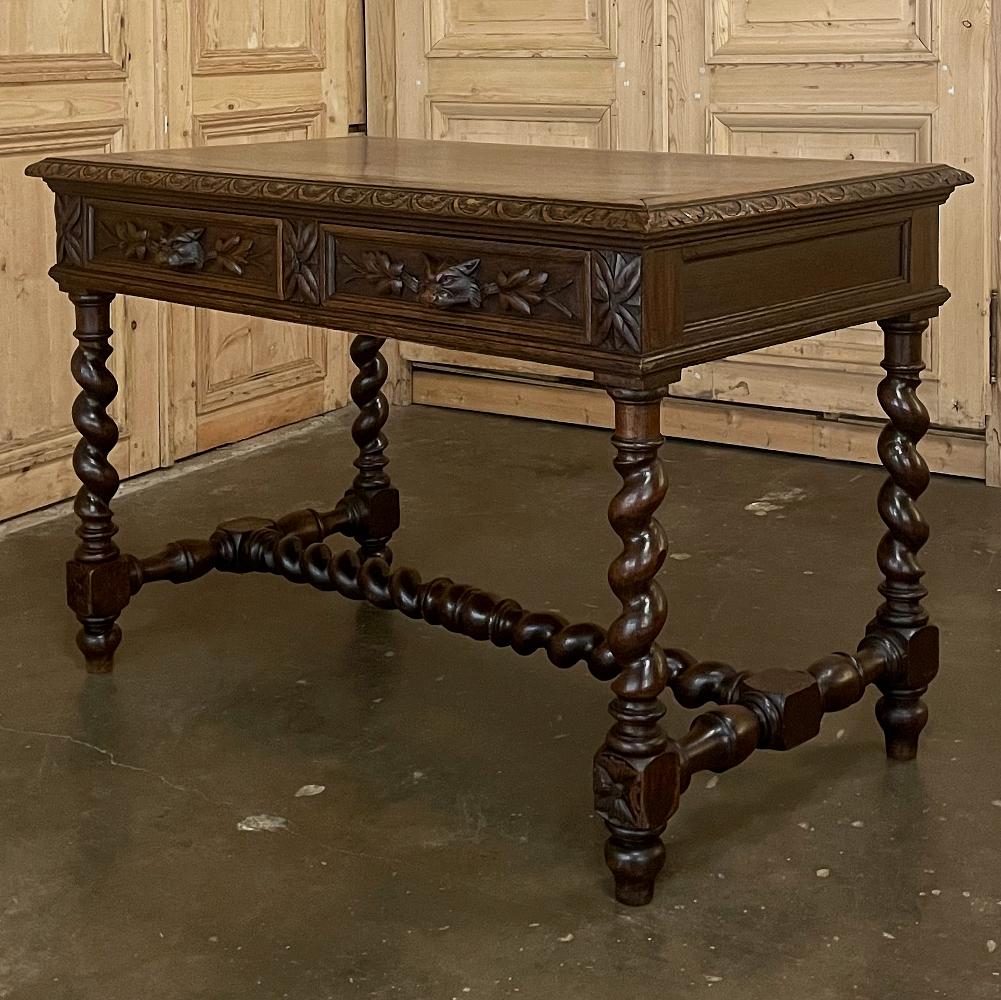 19th century French Renaissance desk ~ Writing table will make a wonderful addition to any masculine decor! Hand-crafted from solid oak, it features a gadrooned top edge overlooking the apron which is designed with two drawers and carved on the