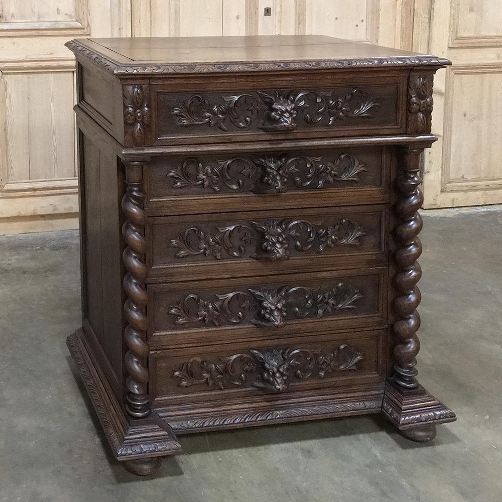 19th Century French Renaissance Flip-Top Washstand was hand-sculpted from solid old-growth quarter-sawn oak, and features elaborately carved drawer facades from top to bottom, the lower four of which are flanked by clockwise & counter-clockwise