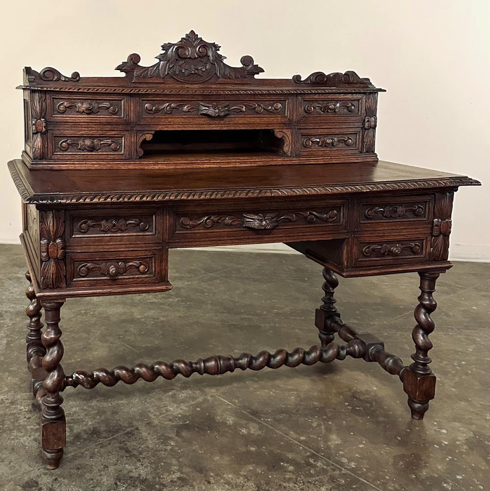 19th Century French Renaissance Hand-Carved Wall Desk is a remarkable testament to the craftsmanship of artisans from the middle of the 1800s in France.  Utilizing dense, old-growth oak to ensure this keepsake would last for generations, they