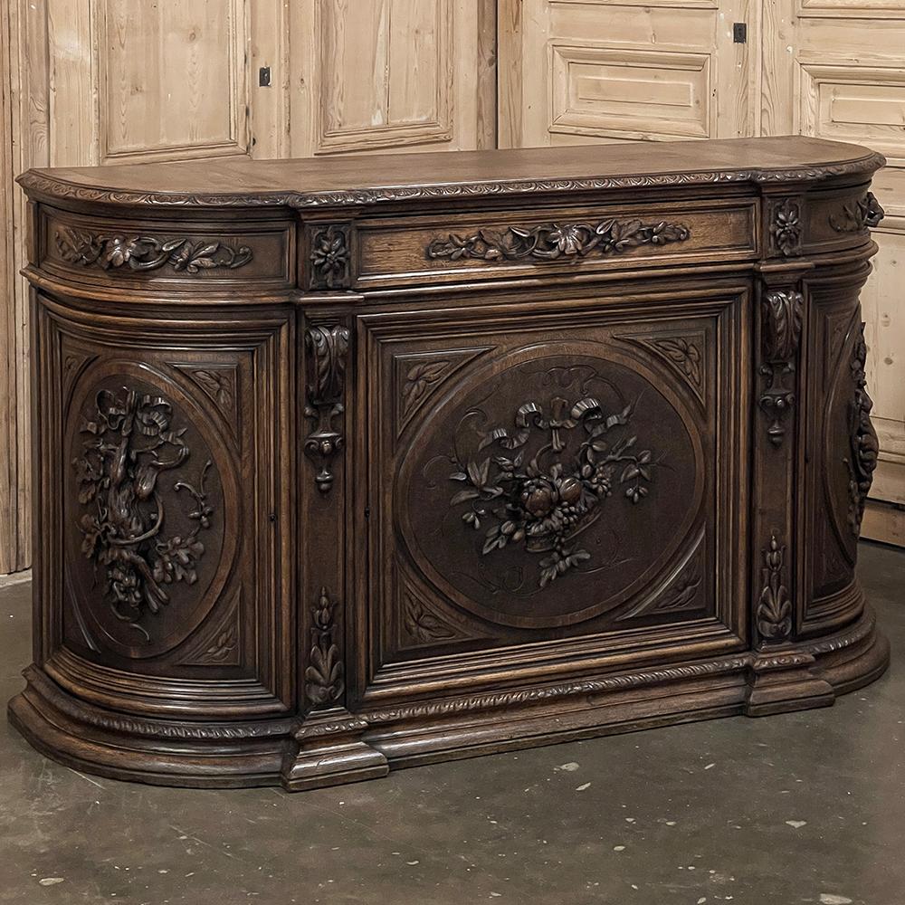 19th Century French Renaissance Hunt Buffet ~ Credenza is a magnificent example of fine furniture craftsmanship married to amazingly artistic sculpture!  The rounded sides create a visual impact that belies the actual measured width of over five