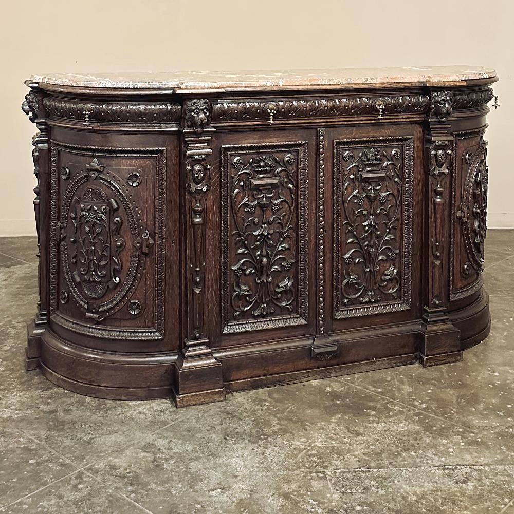 19th Century French Renaissance Marble Top Buffet will make a great presence in any room!  The rounded side design is very traffic-friendly, so even though the maximum depth is almost 2 feet, it seems like a smaller piece.  Topped with beveled