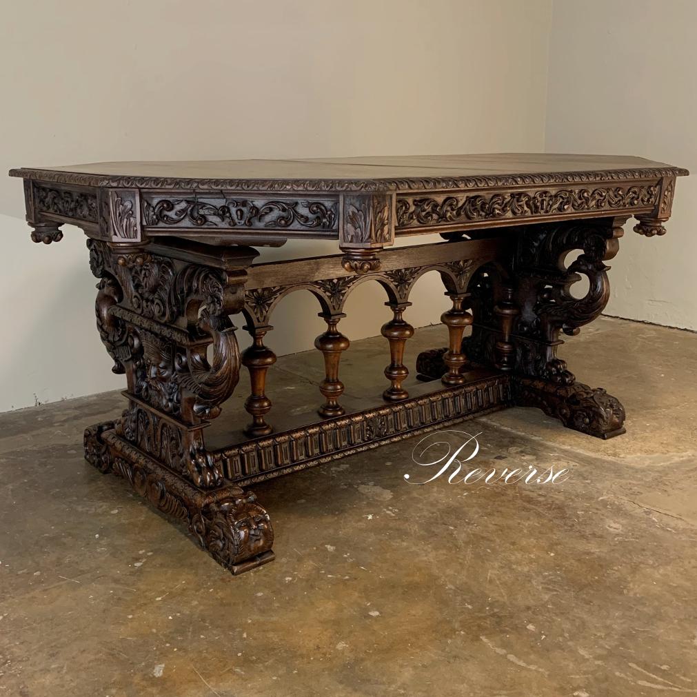 19th century French Renaissance octagonal library table is a stunning example of exceptional French quality, with boldly sculpted Renaissance motifs encircling the entire eight sided affair with support provided by artistic works that deserve to be
