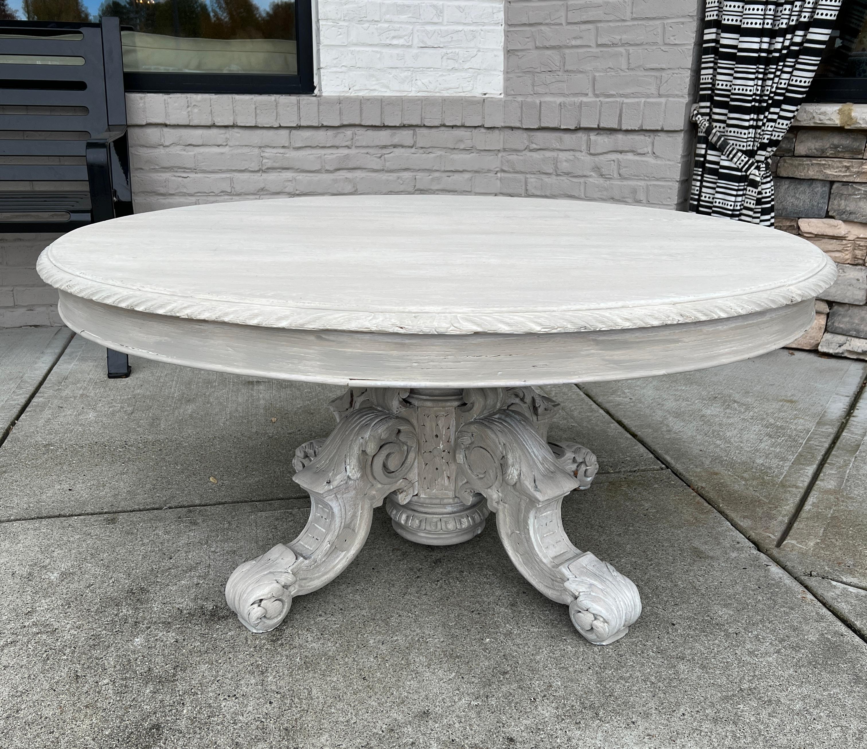 19th Century French Renaissance Oval Coffee Table will make a perfect centerpiece for your family room! Solid oak planks combine to create a sturdy top, cut in an oval shape and carved with gadrooning along the edge all around. Support is provided