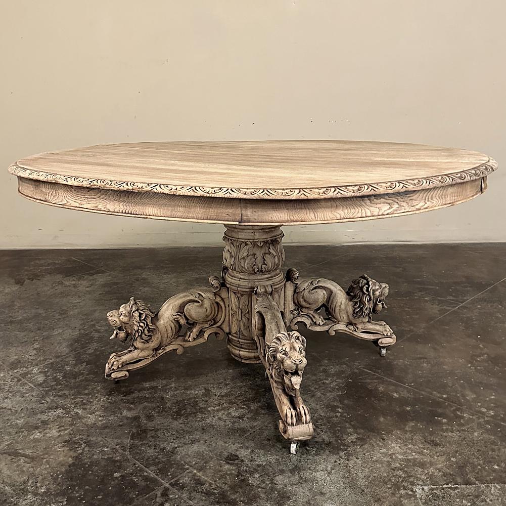 19th Century French Renaissance Pedestal Dining ~ Center Table will add a regal touch to any room!  Four lions in full relief adorn the fancy scrolled legs that join with the intricately carved massive center pedestal to support the spacious round