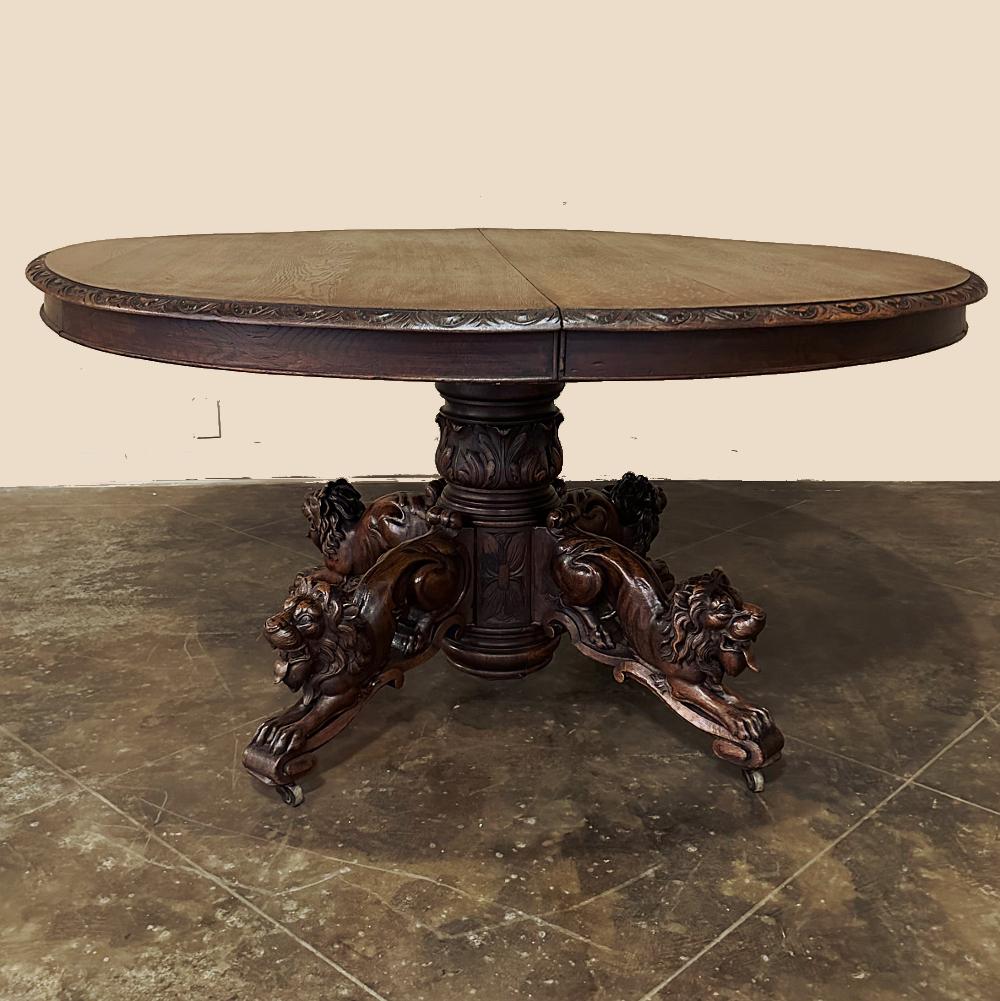 19th century French Renaissance Revival Dining Table ~ Center Table is a stunning testament to the skilled sculptors and cabinetmakers of mid-1800s France! Crafted entirely from dense, old growth oak, it features a solid plank top with the edge