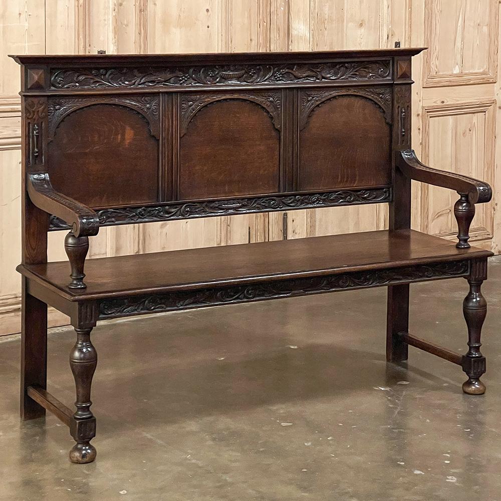 19th Century French Renaissance Revival Hall Bench represents the essence of the form, combining a classically inspired carved detail and urn forms with the exuberance of the Renaissance to dress up your entryway or hallway!  Designed to allow