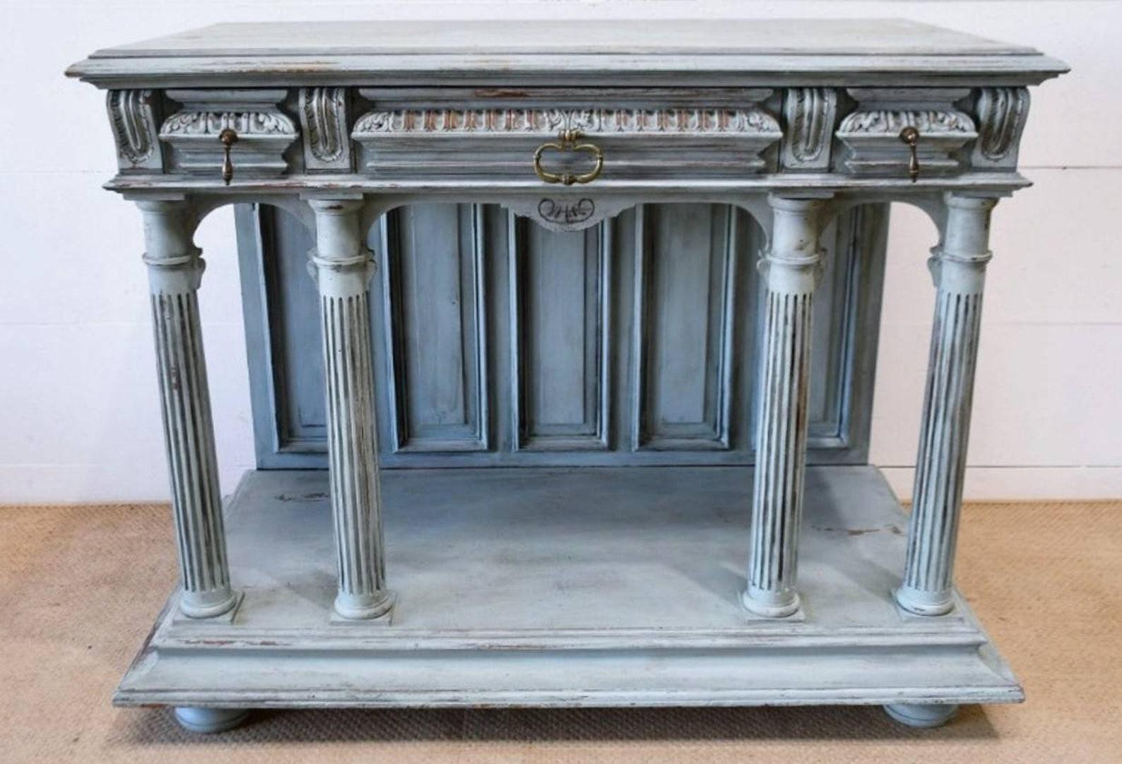 French Perfection!! A most impressive Renaissance Revival Henry II style well carved solid walnut sideboard server from the second half of the 19th century, finished in later chic distressed dusty blue painted finish with light airy hues of chalky