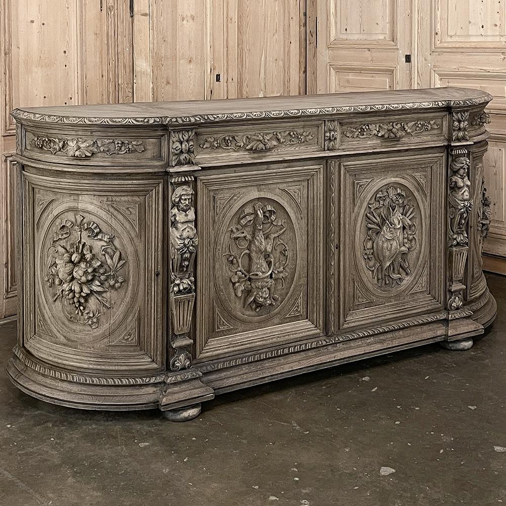 19th century French Renaissance Revival Hunt Buffet represents a spectacular example of the glorious revival of the Renaissance that occurred during the middle of the century all across Europe, inspired by the monarchy of Napoleon III. This example