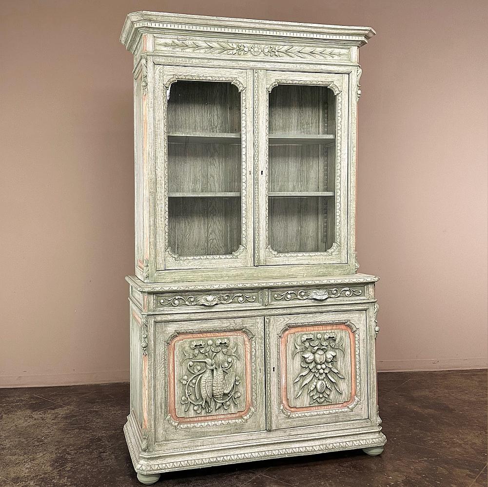 19th Century French Renaissance Revival Painted Hunt Bookcase is a majestic reminder of a bygone era when it was a privilege to have an education, much less to be able to afford a bookcase and the books to go inside!  Crafted by master artisans from