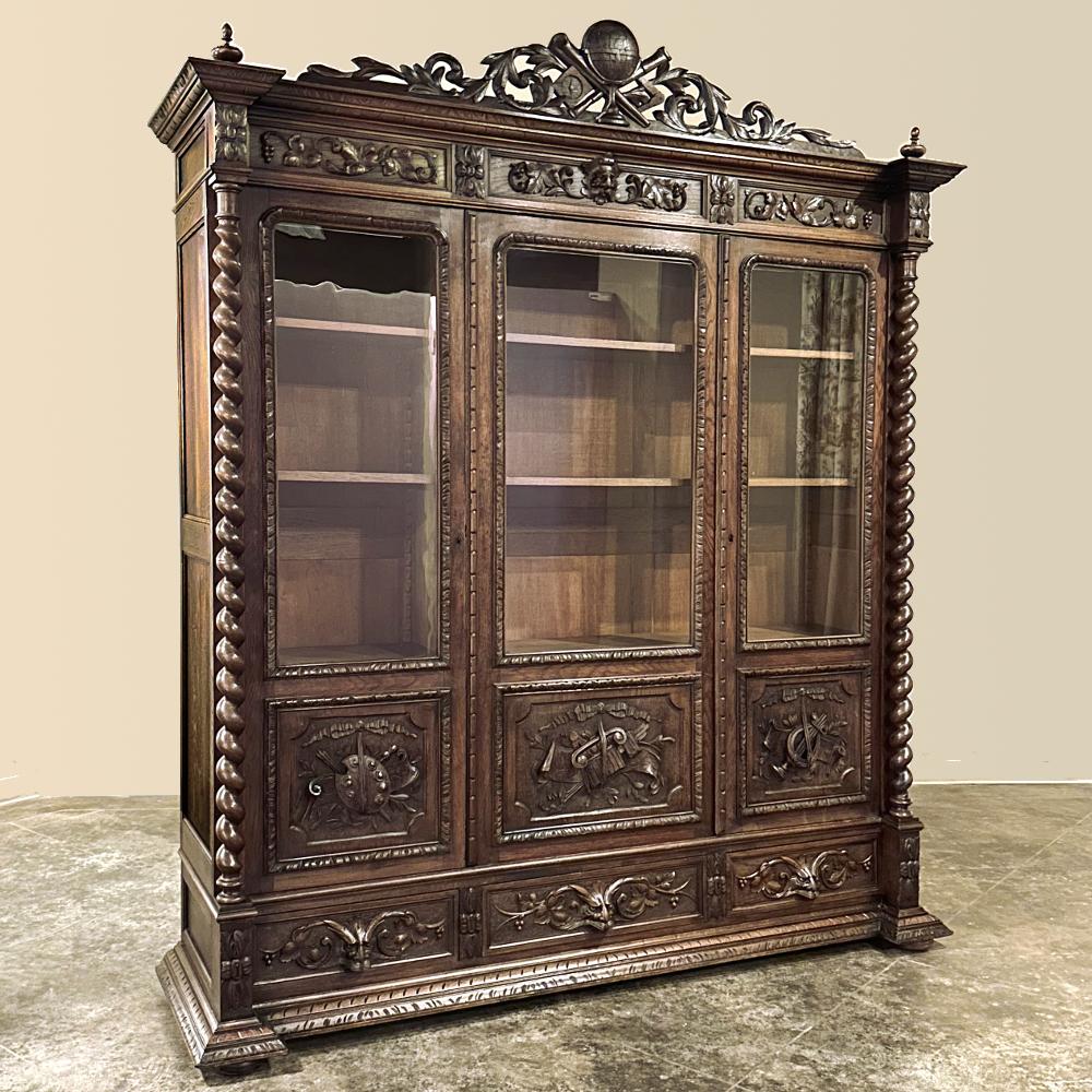 19th Century French Renaissance Triple Bookcase ~ Display Cabinet is a magnificent example of the revival of the Renaissance that occurred in the latter half of the 1800s in Europe, especially in France, especially impressive given the political