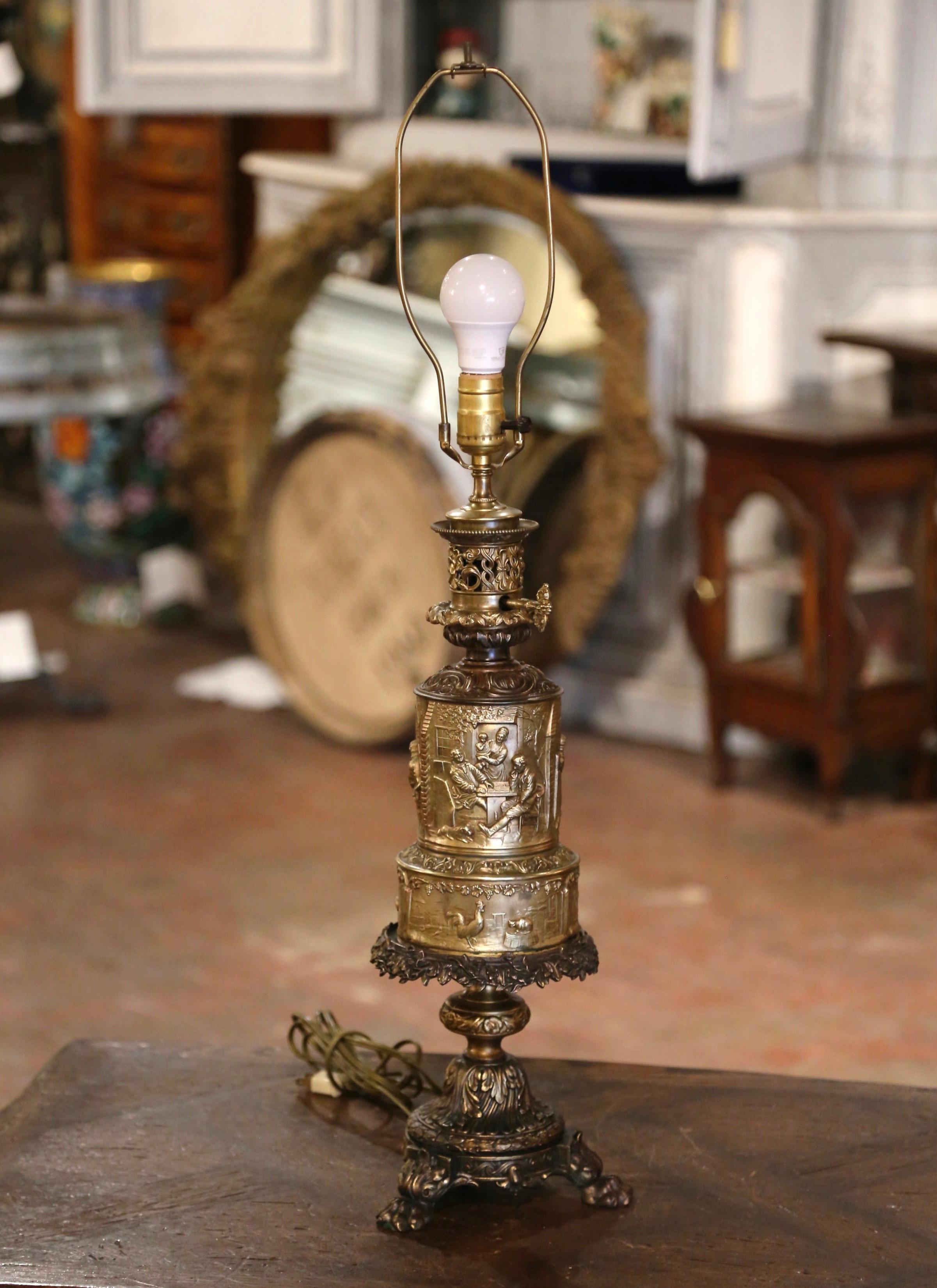 This elegant antique oil lamp made into table lamp was crafted in France, circa 1870. The tall 
