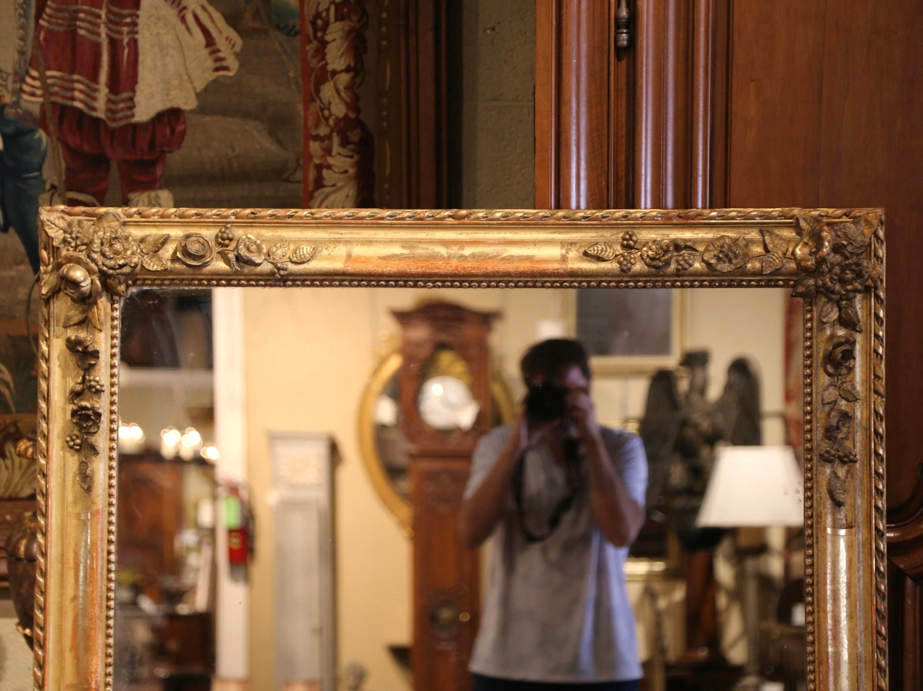 Hand-Carved 19th Century French Restauration Carved Gilt Mirror with Floral & Fruit Motifs For Sale
