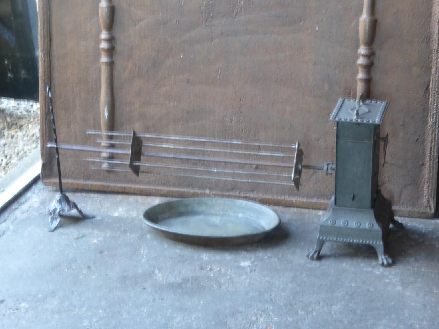 19th century French Napoleon III roasting jack and attachments made of wrought iron and brass. The roasting jack can be used for cooking in the fireplace. It is fully functional. It is a complete set.

 



 

