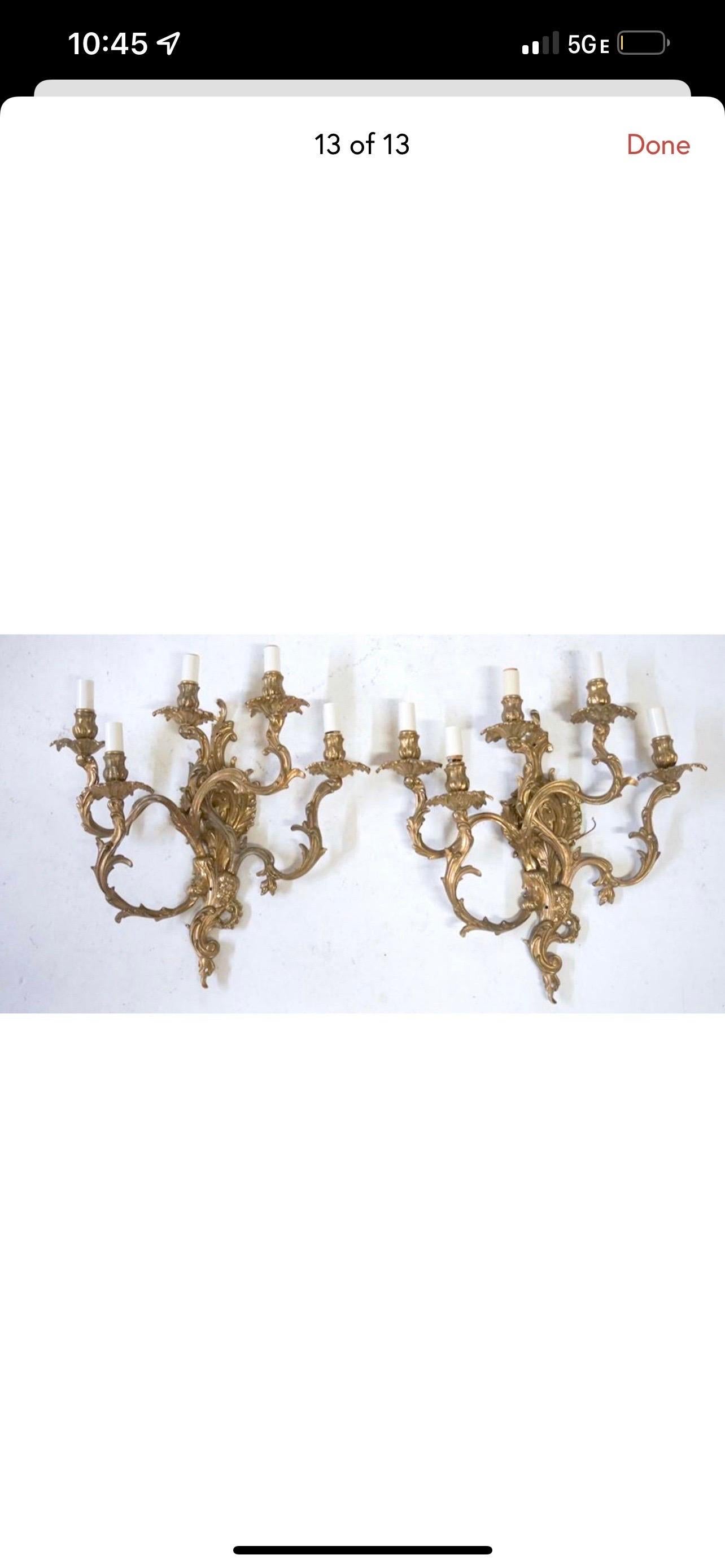 These stunning caste brass 5 arm wall sconces have been converted to be hard wired. They are just absolutely stunning. I always recommend getting any vintage lighting rewired but they were in working condition when removed from the house. I