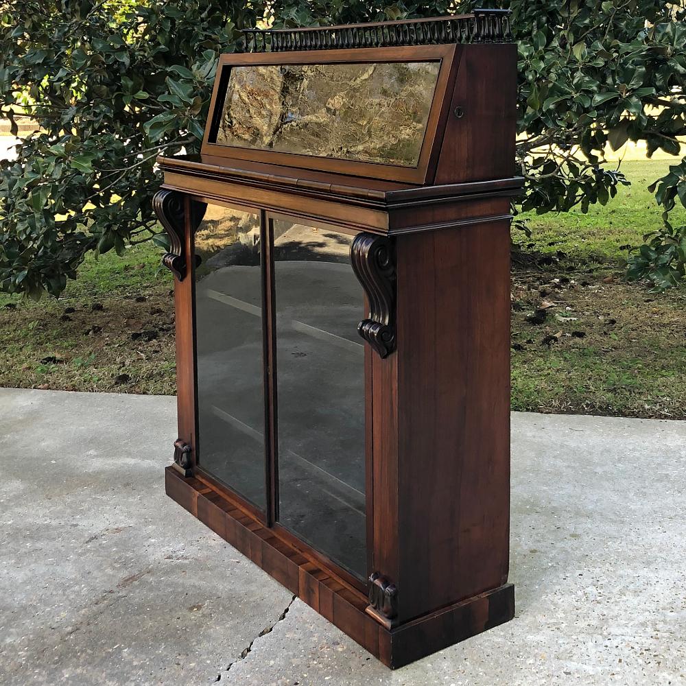 19th century French rosewood display case is an amazing relic from a bygone era, when exquisite but small shops lined the busy city streets and one could spend the day going in and out the various emporiums. This display case was designed for an
