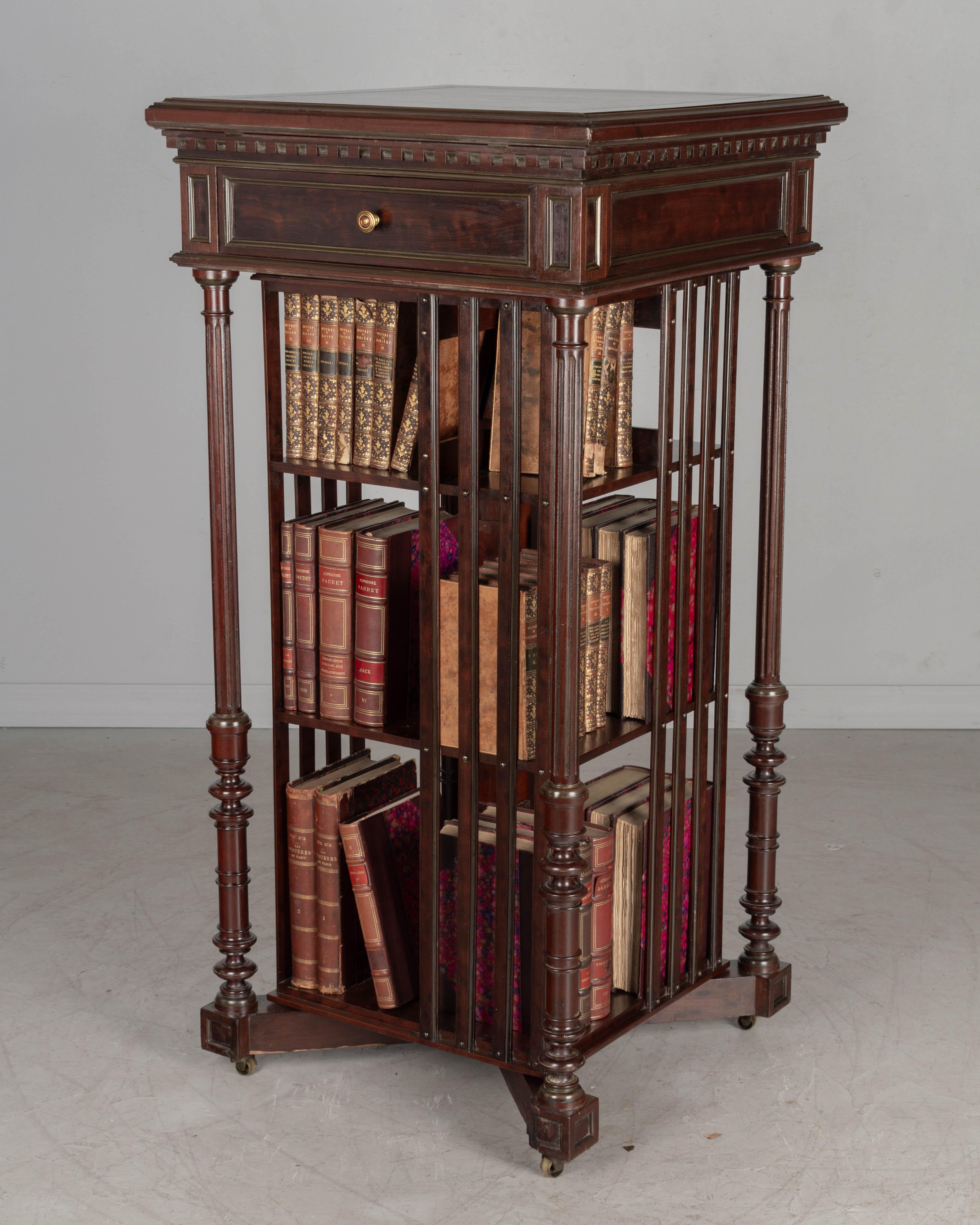 Hand-Crafted 19th Century French Rotating Bookcase by Terquem, Paris For Sale