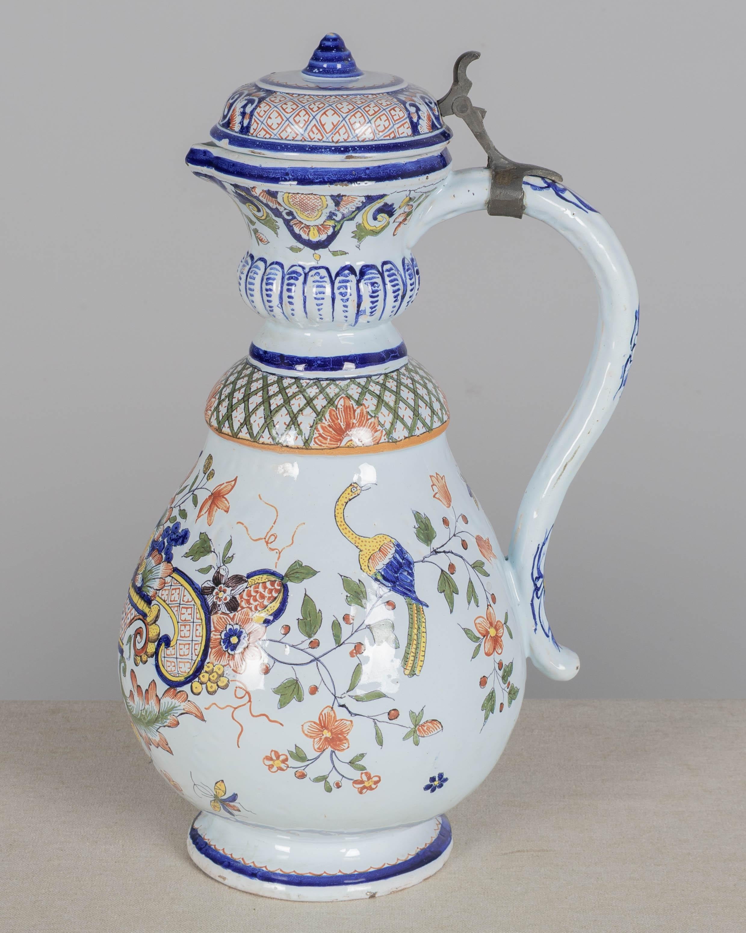 Vernissé Pichet en faïence de Rouen du 19e siècle en vente