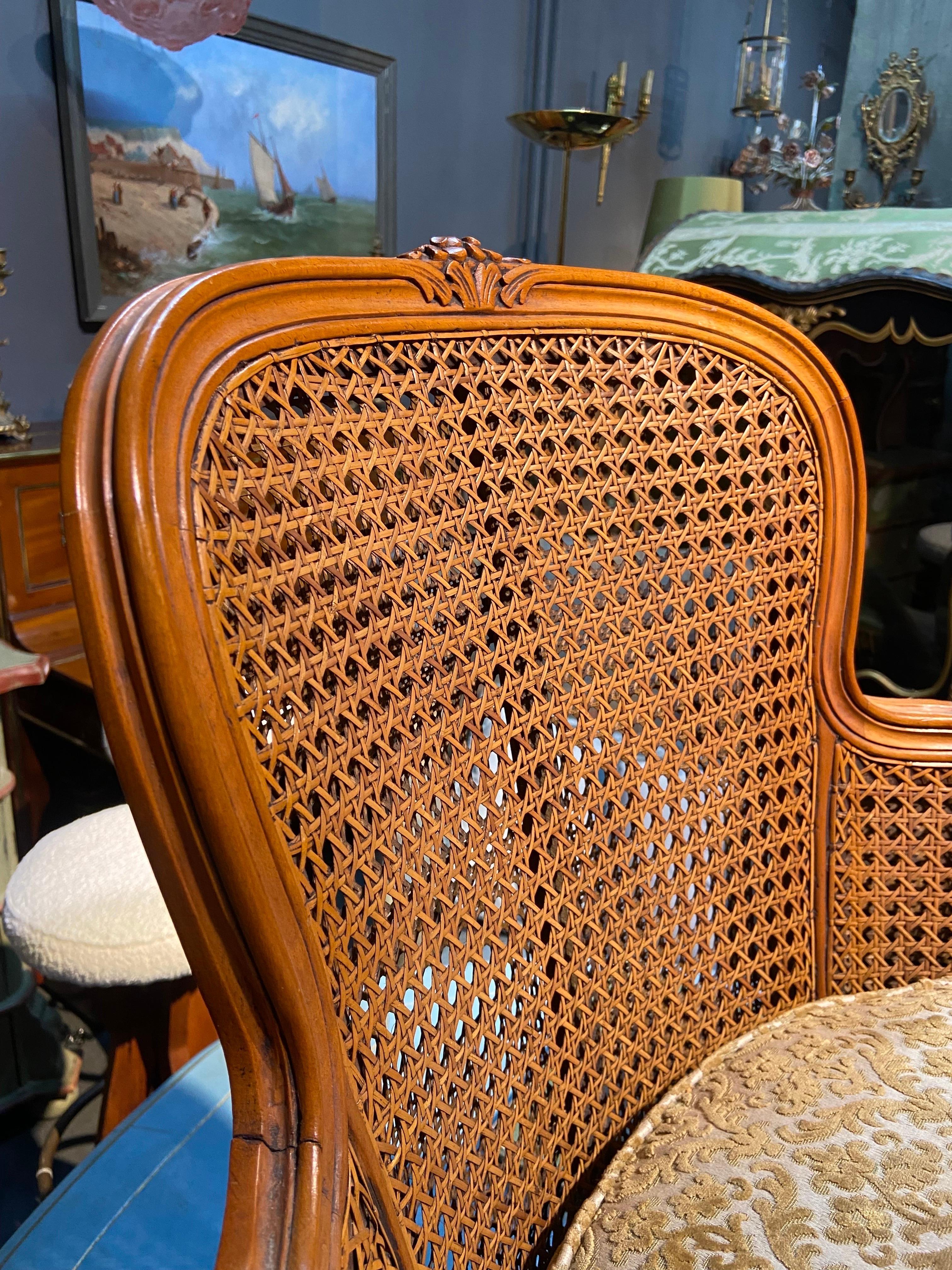 Hand-Carved 19th Century French Round Bergere Chair in Hand Carved Walnut Wood with Cane For Sale