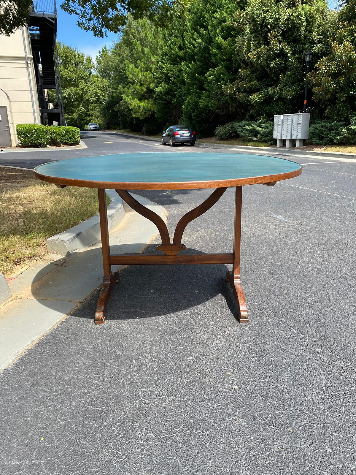 19th century French round tilt-top wine tasting table with custom painted top
Height when tilted up: 51.25
