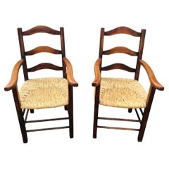 19th Century French Rush Seat Armchairs - a Pair