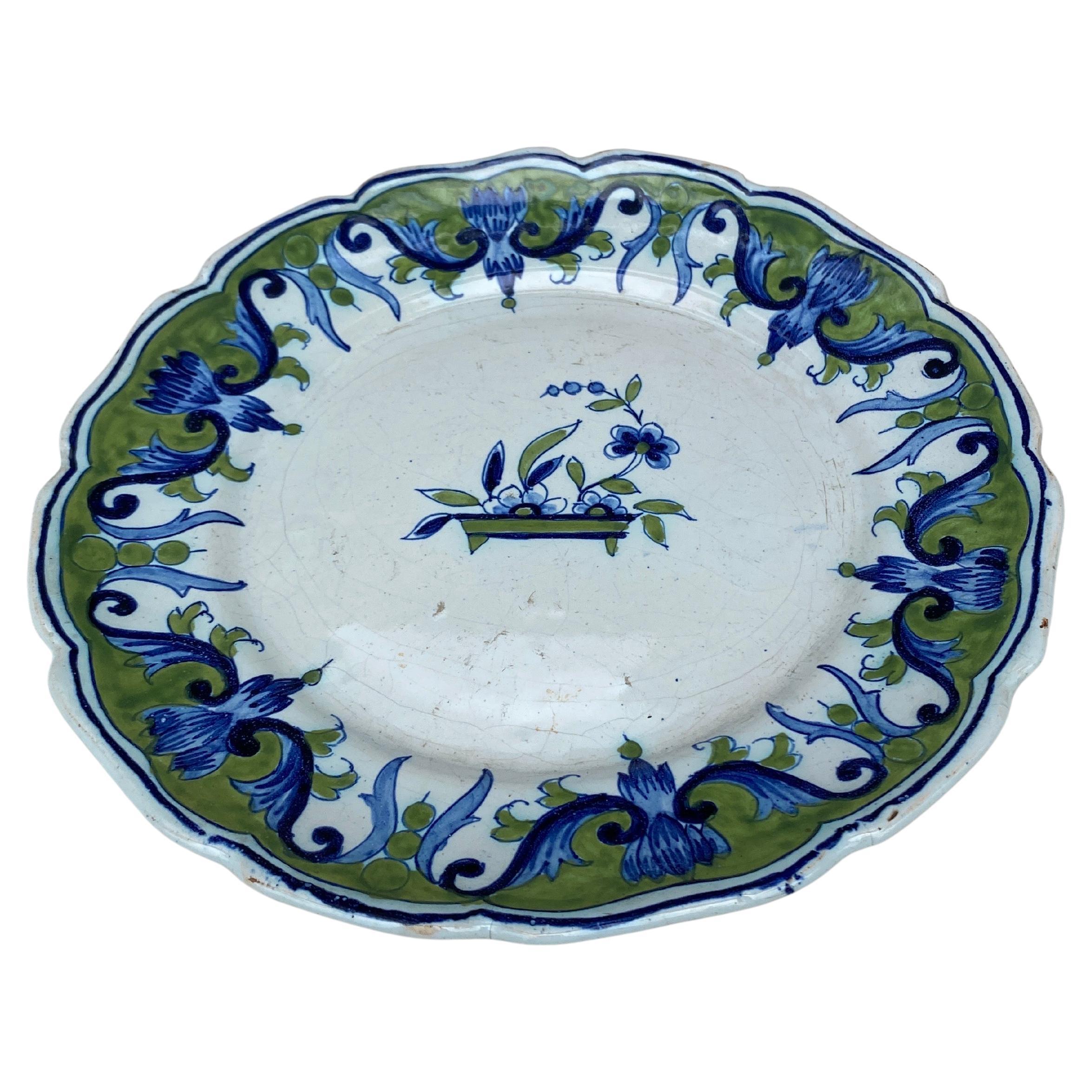 19th Century French Rustic Faience Plate Desvres  signed Gabriel Emile Fourmaintraux.
Painting of flowers blue and olive colors.
 