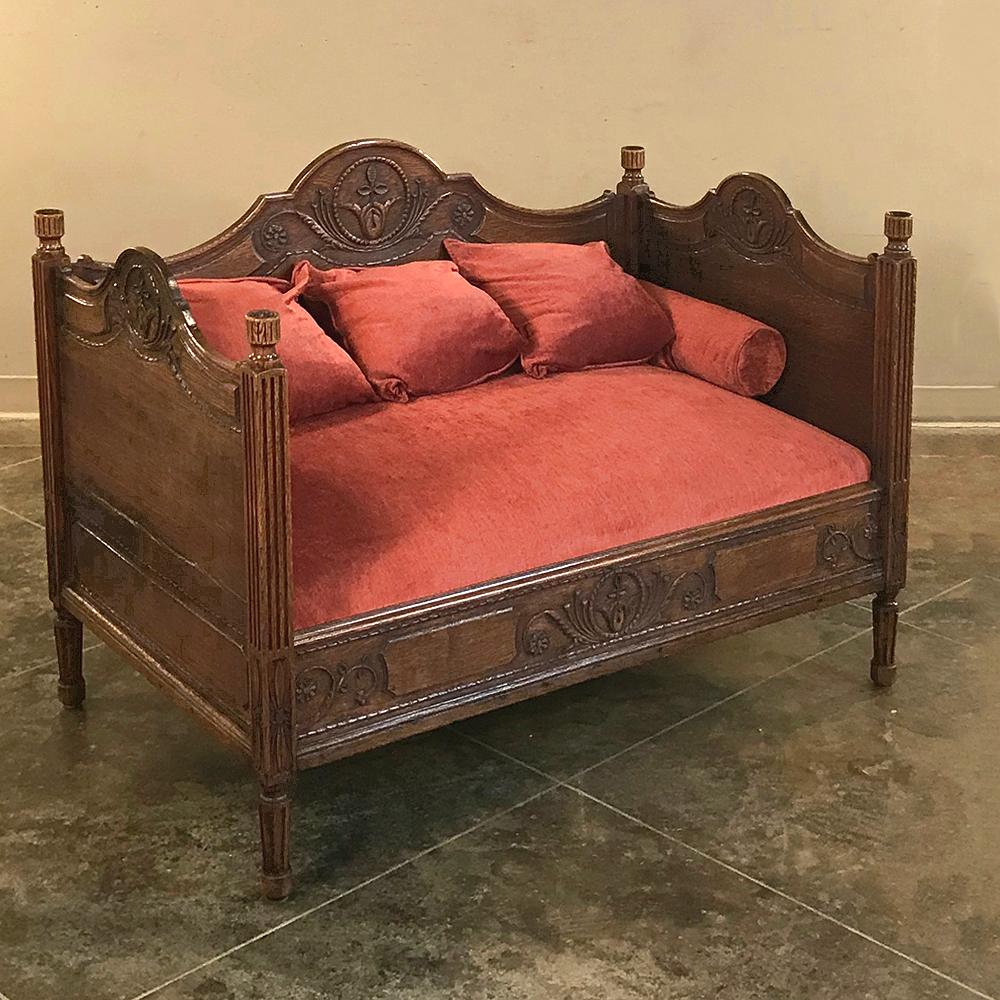 19th Century French Rustic Louis XVI Canapé (petite sofa) has more charm than a house full of modern furniture! Hand-crafted and carved to emulate the style dictated by the court of King Louis XVI, it is an ideal choice as a cozy sofa that is