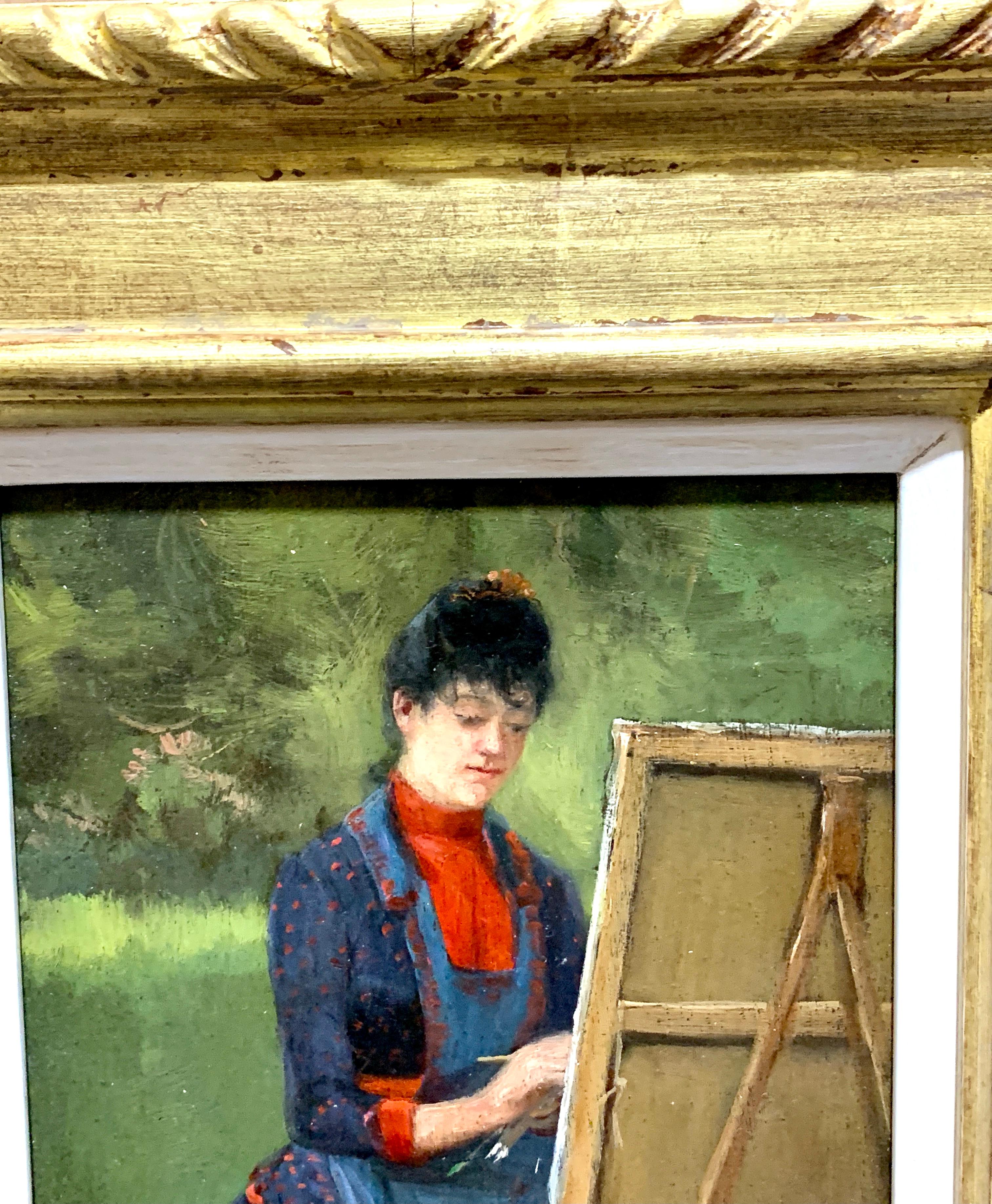 woman painting on easel